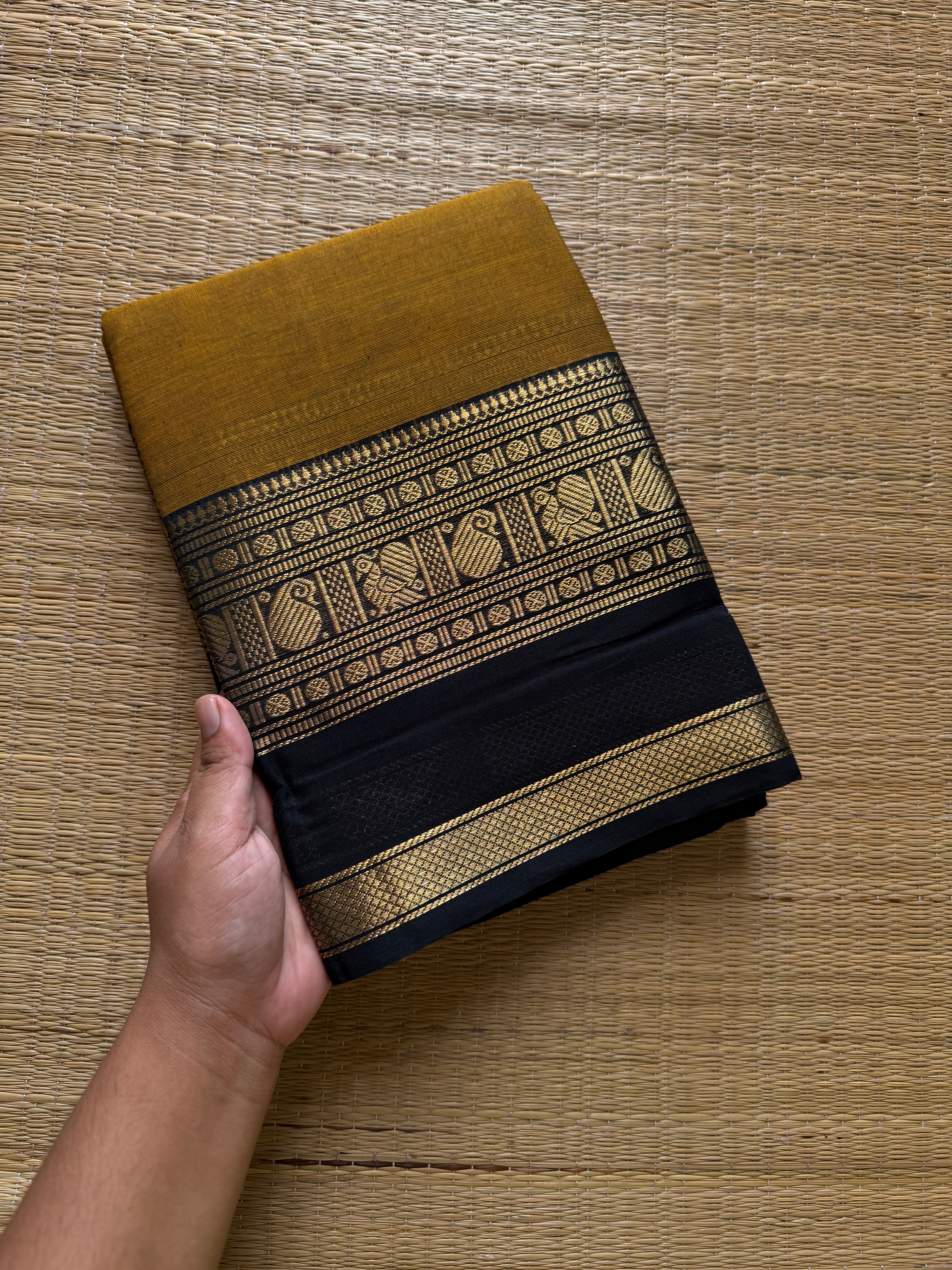 RF703 Mustard with black combination Kanchi cotton saree with handmade thread buttas