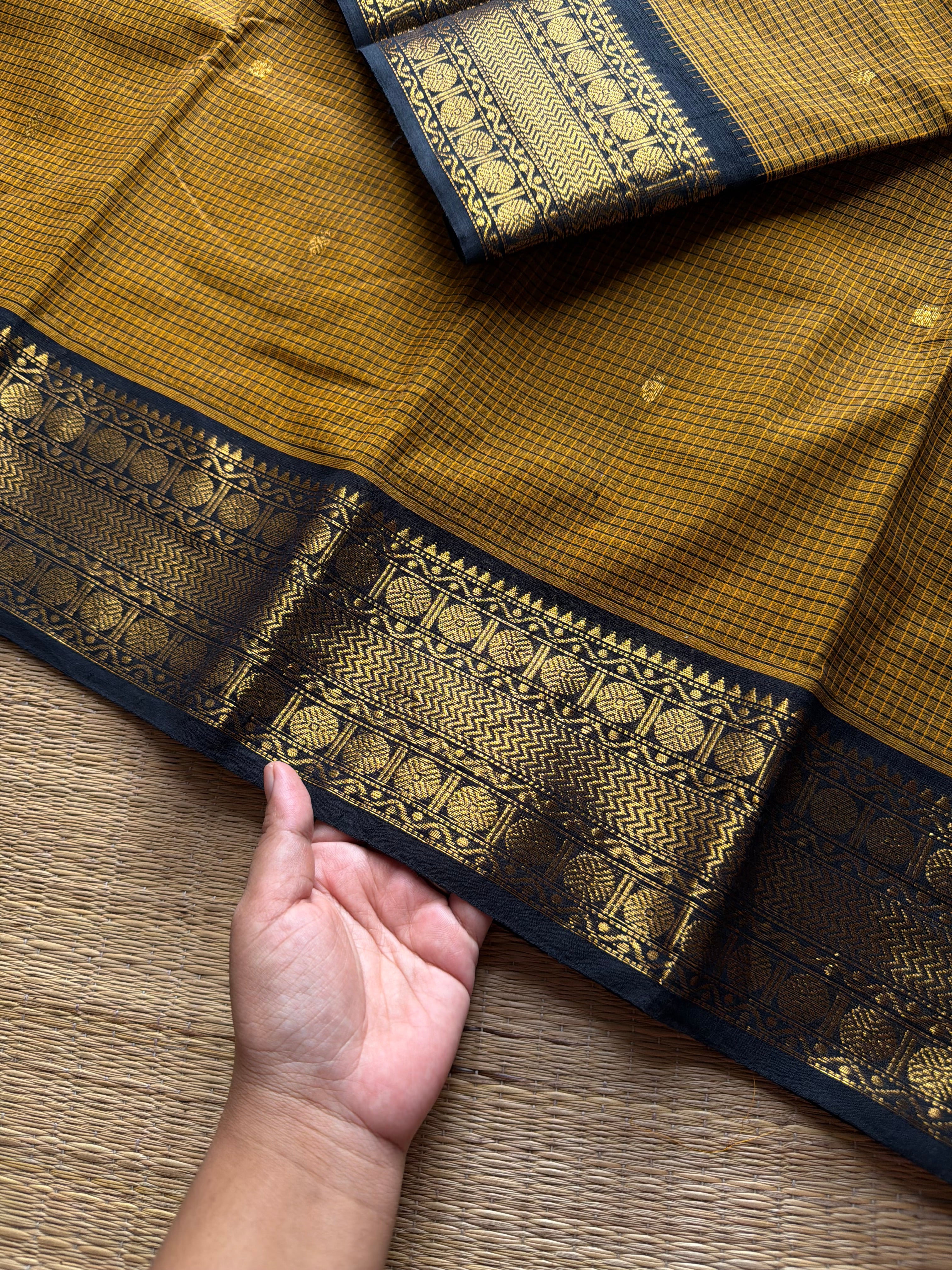 RF1340 Podi Kattam Edition ~ Mustard with black combination Kanchi cotton saree with handmade thread buttas