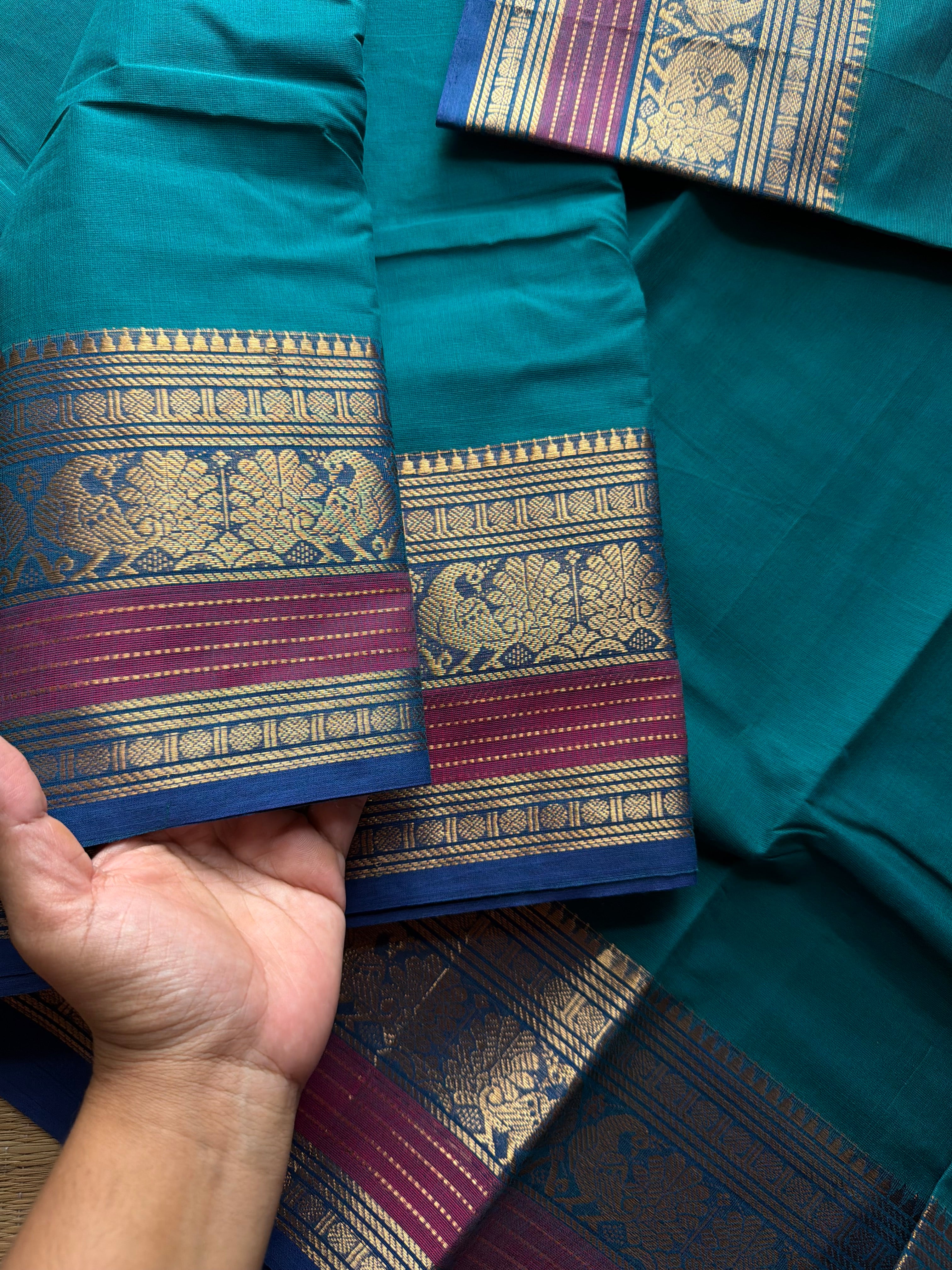 Teal blue shad Kanchi cotton saree with Annam pattern contrast border