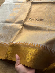 Cream with mustard combination Kanchi cotton saree with rich Zari woven Pallu and handmade golden Zari Buttas