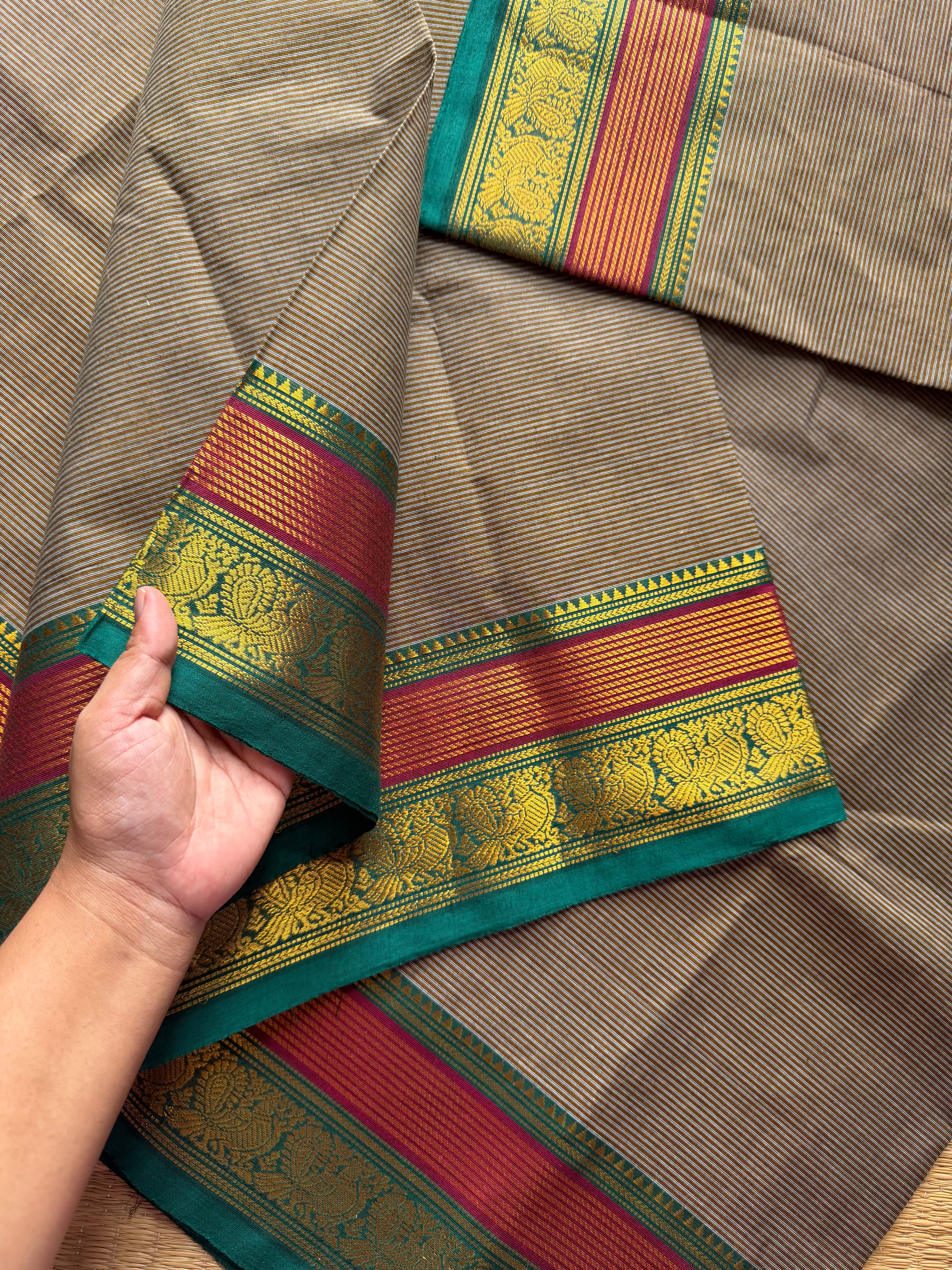 RF473 Grey Kanchi cotton saree with horizontal small stripped pattern and unique multi color peacock pattern Zari border