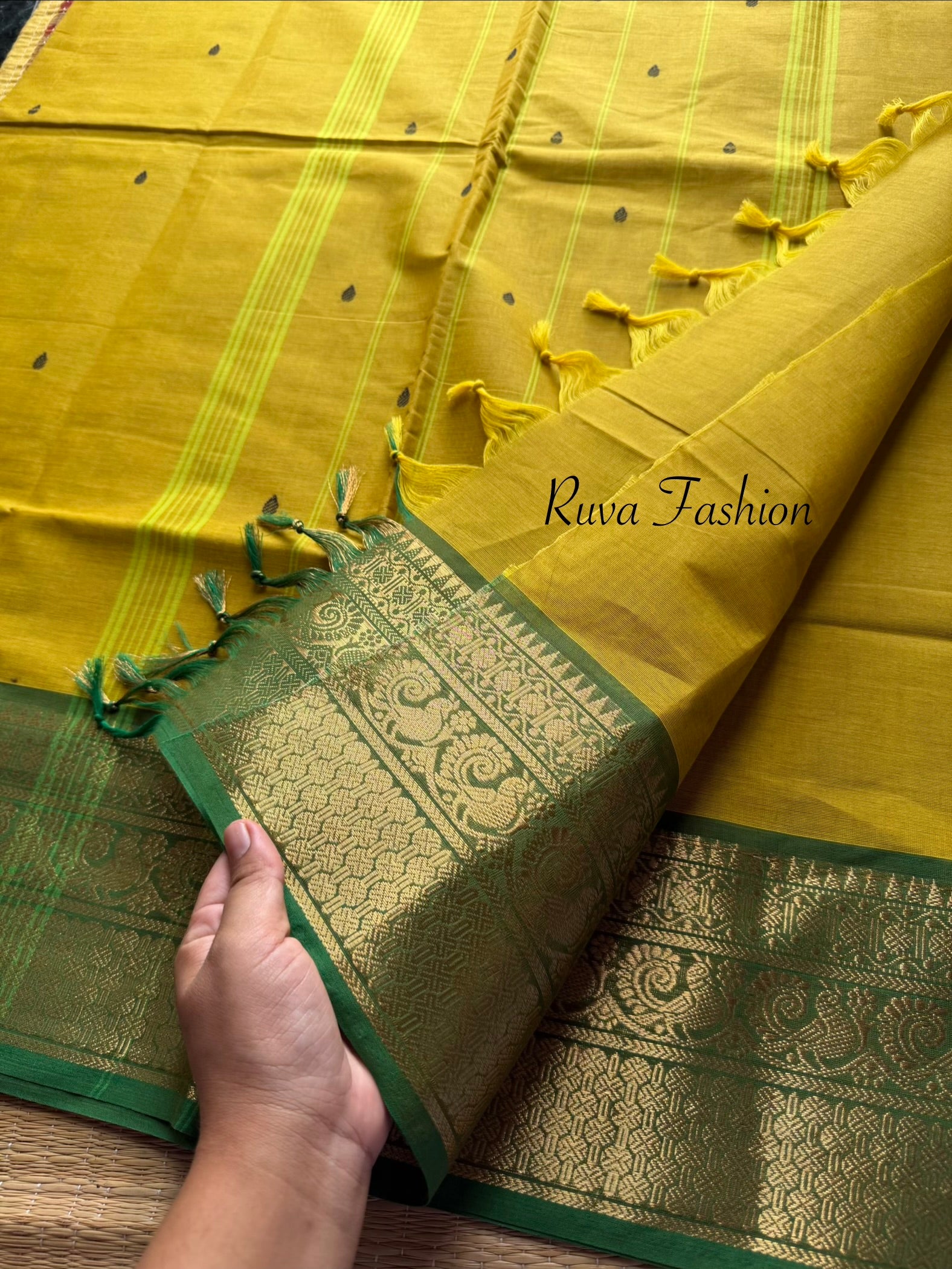 Mustard yellow tone with contrast green Zari border Kanchi cotton saree with handmade thread buttas