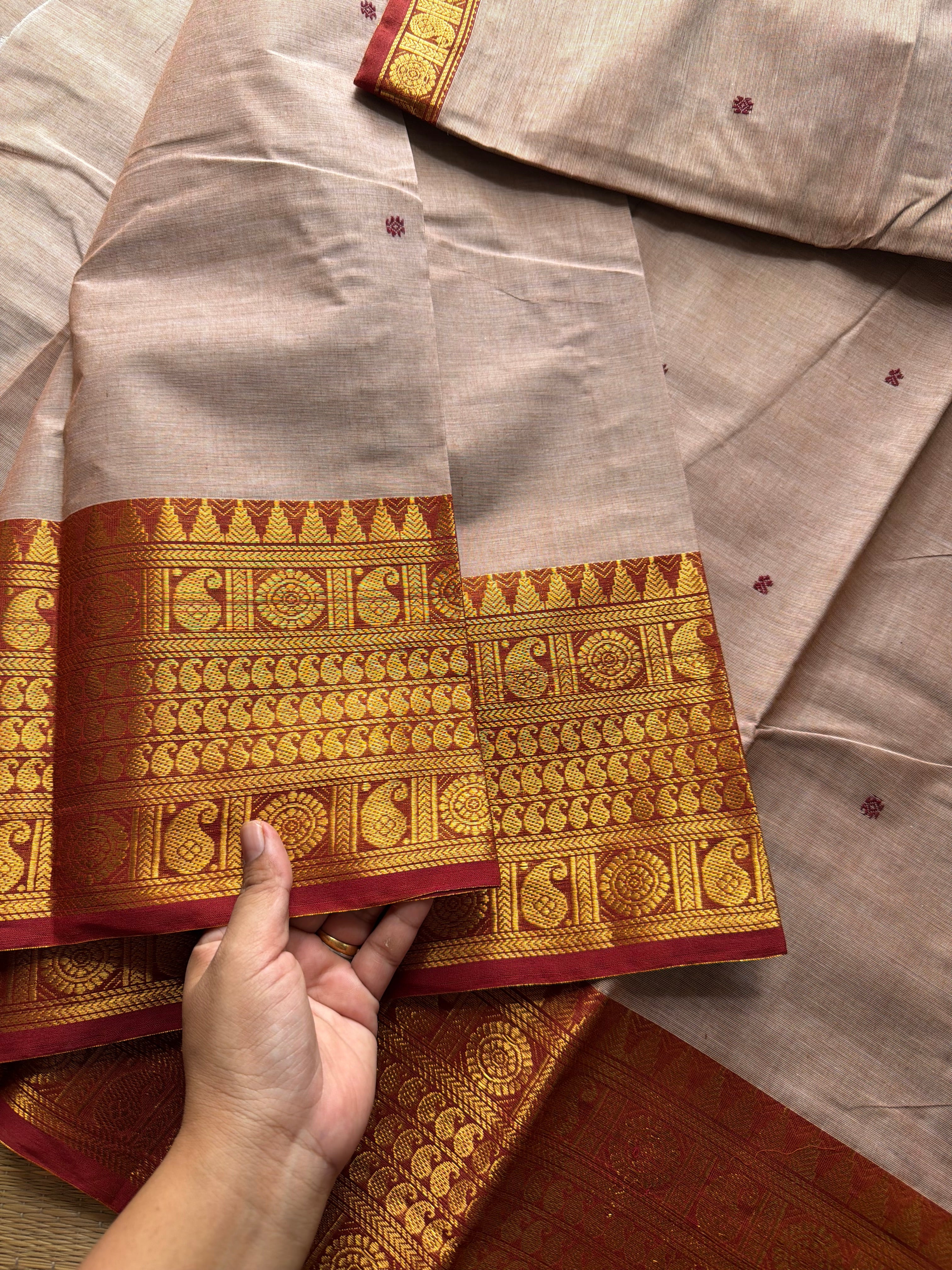 Beige with rust orange combination Kanchi cotton saree with handmade thread buttas