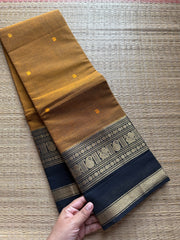 RF288 Mustard with black combination Kanchi cotton saree with Rettapet border and handmade thread buttas