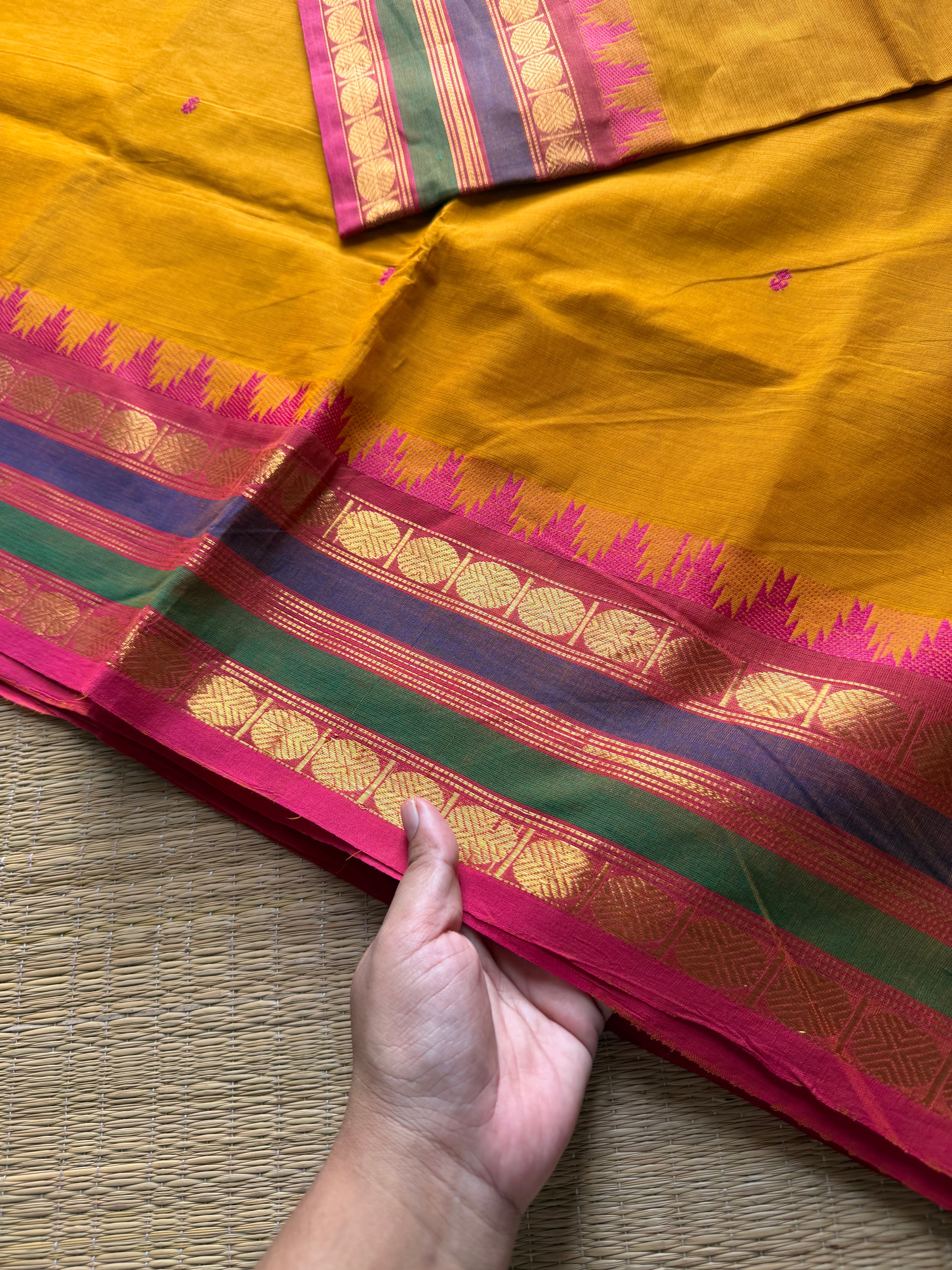 RF735 Dual tone mustard yellow shade Kanchi cotton saree with multicolour Thazhampoo pattern border and handmade thread buttas