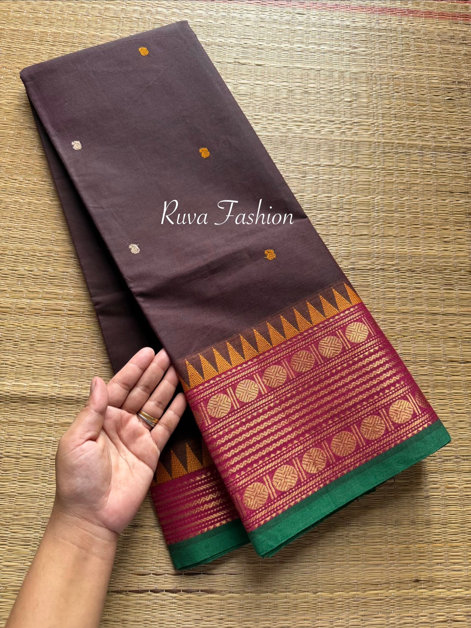 Brown shade Kanchi cotton saree with unique contrast border and handmade thread buttas