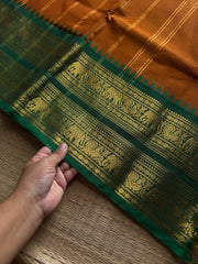 RF1137 Burnt Orange shade with green combination Rettapet border Kanchi cotton saree