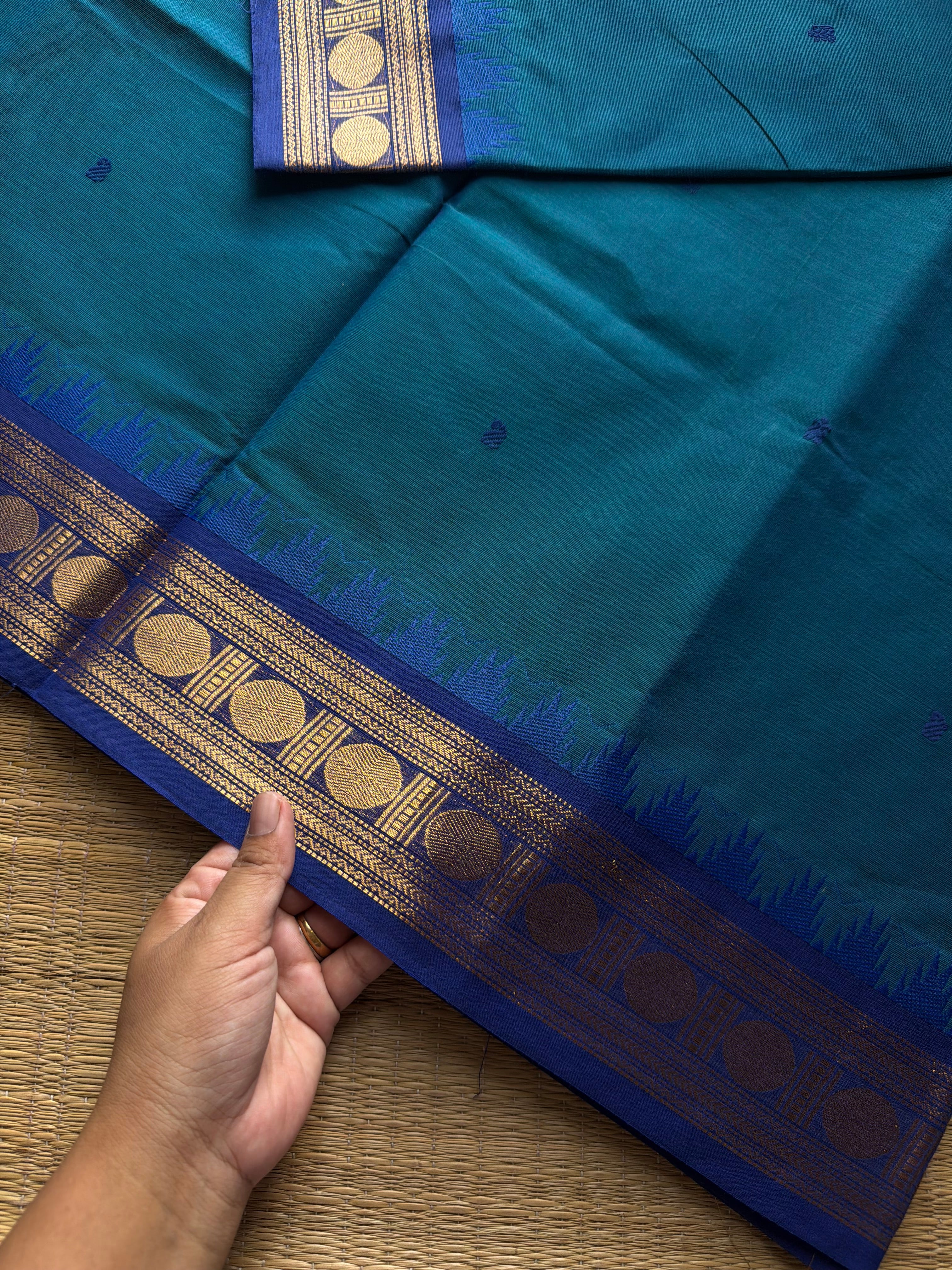 RF1022 Peacock blue shade Kanchi cotton saree with handmade thread buttas