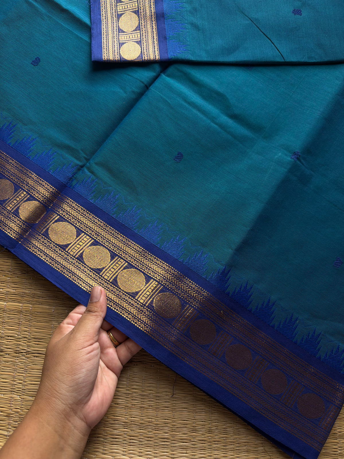 RF1022 Peacock blue shade Kanchi cotton saree with handmade thread buttas