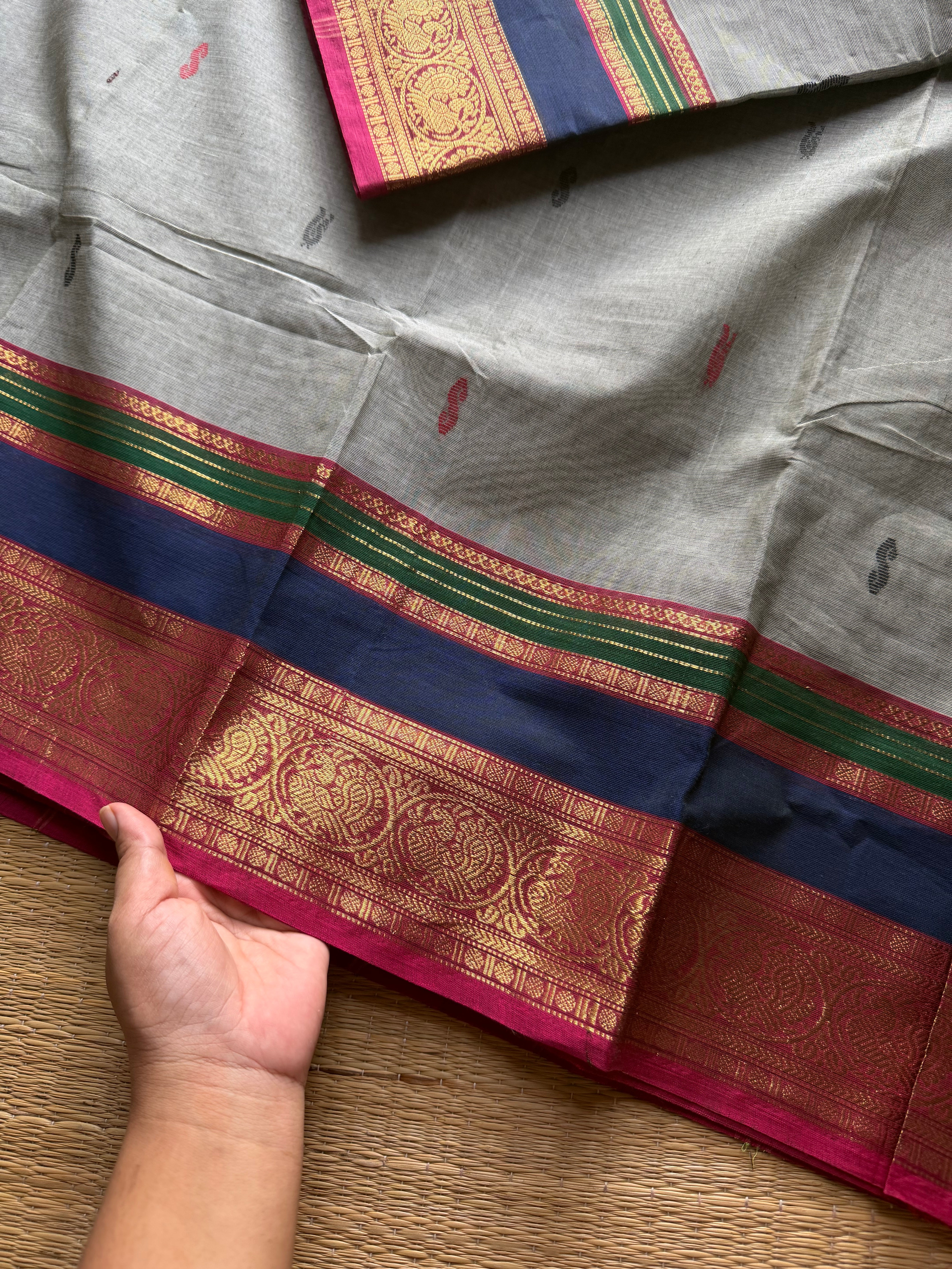 Dual tone grey shade Kanchi cotton saree with multi color contrast border and handmade thread buttas