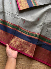 Dual tone grey shade Kanchi cotton saree with multi color contrast border and handmade thread buttas