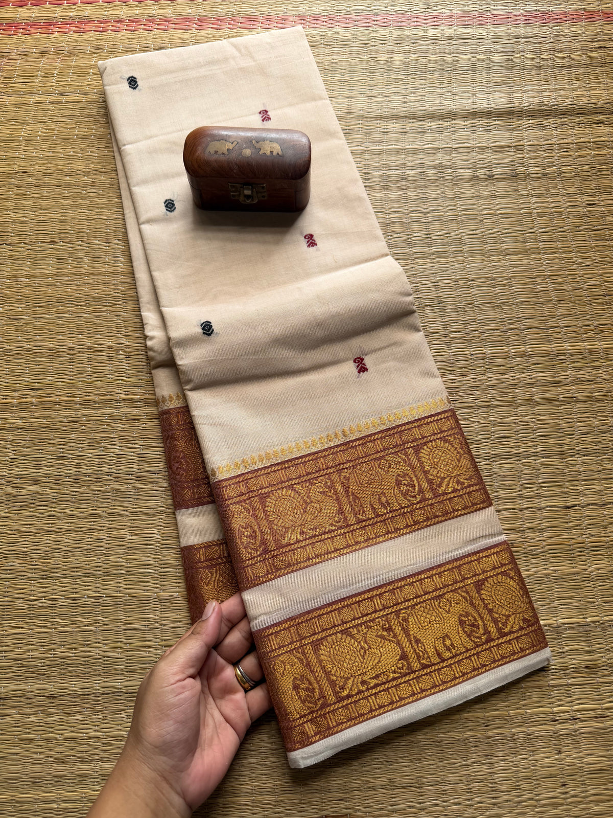 Half White Shade Kanchi Cotton Saree With Retta Patta Border And Handmade Thread Buttas