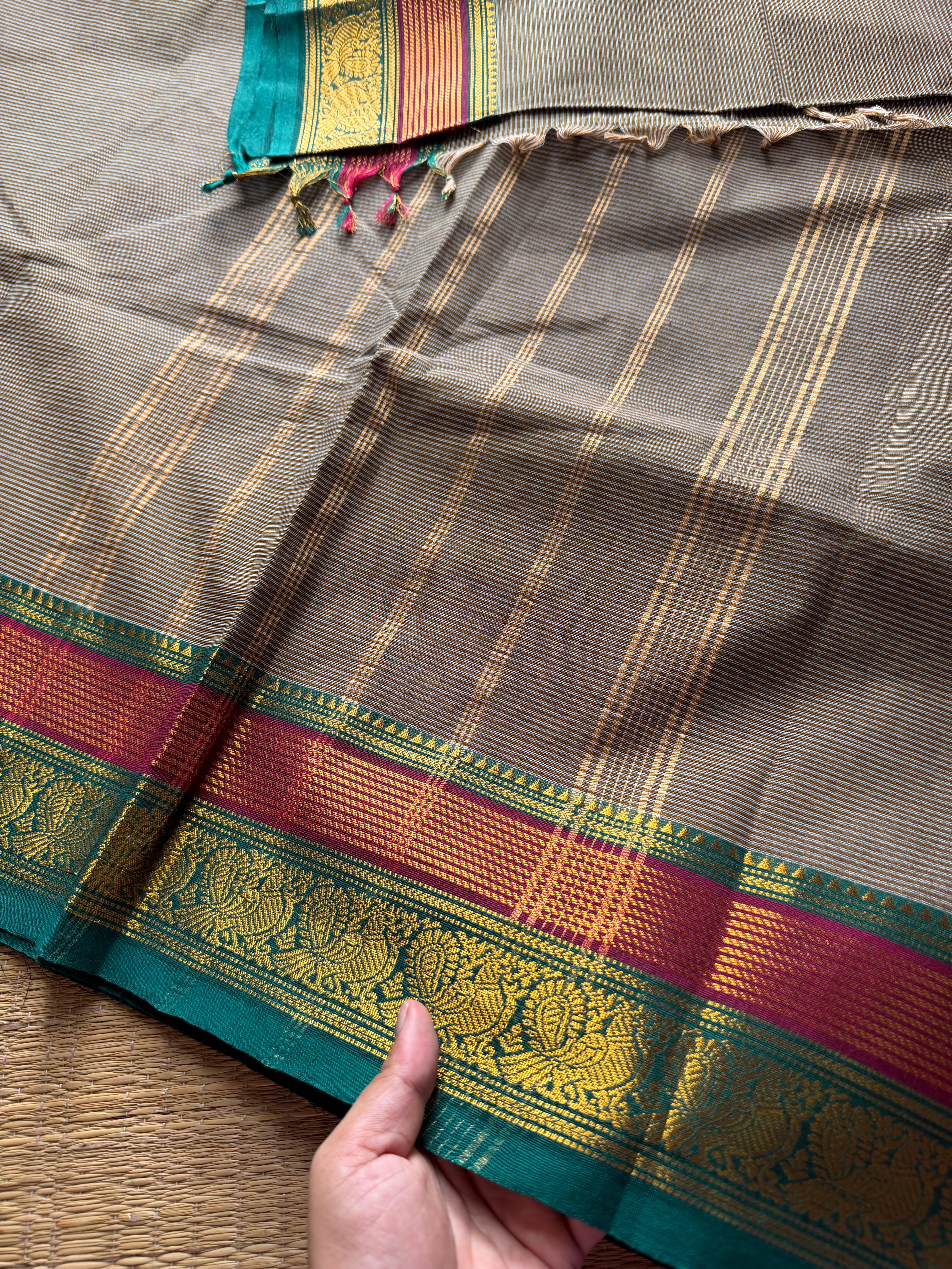 RF473 Grey Kanchi cotton saree with horizontal small stripped pattern and unique multi color peacock pattern Zari border