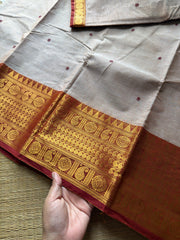 Beige with rust orange combination Kanchi cotton saree with handmade thread buttas