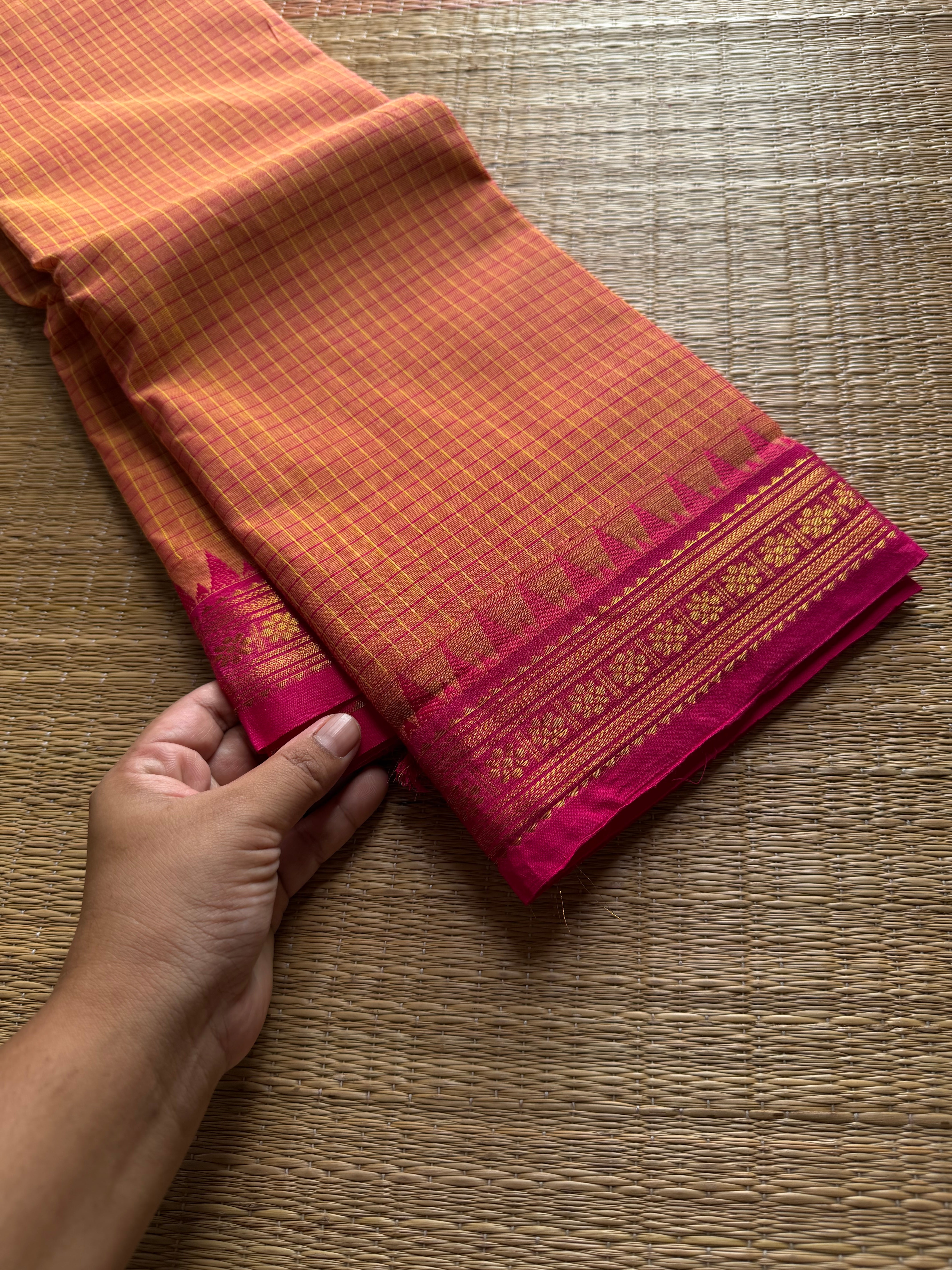 Podi Kattam ~ Dual tone orange shade pink combination small checks Kanchi cotton saree