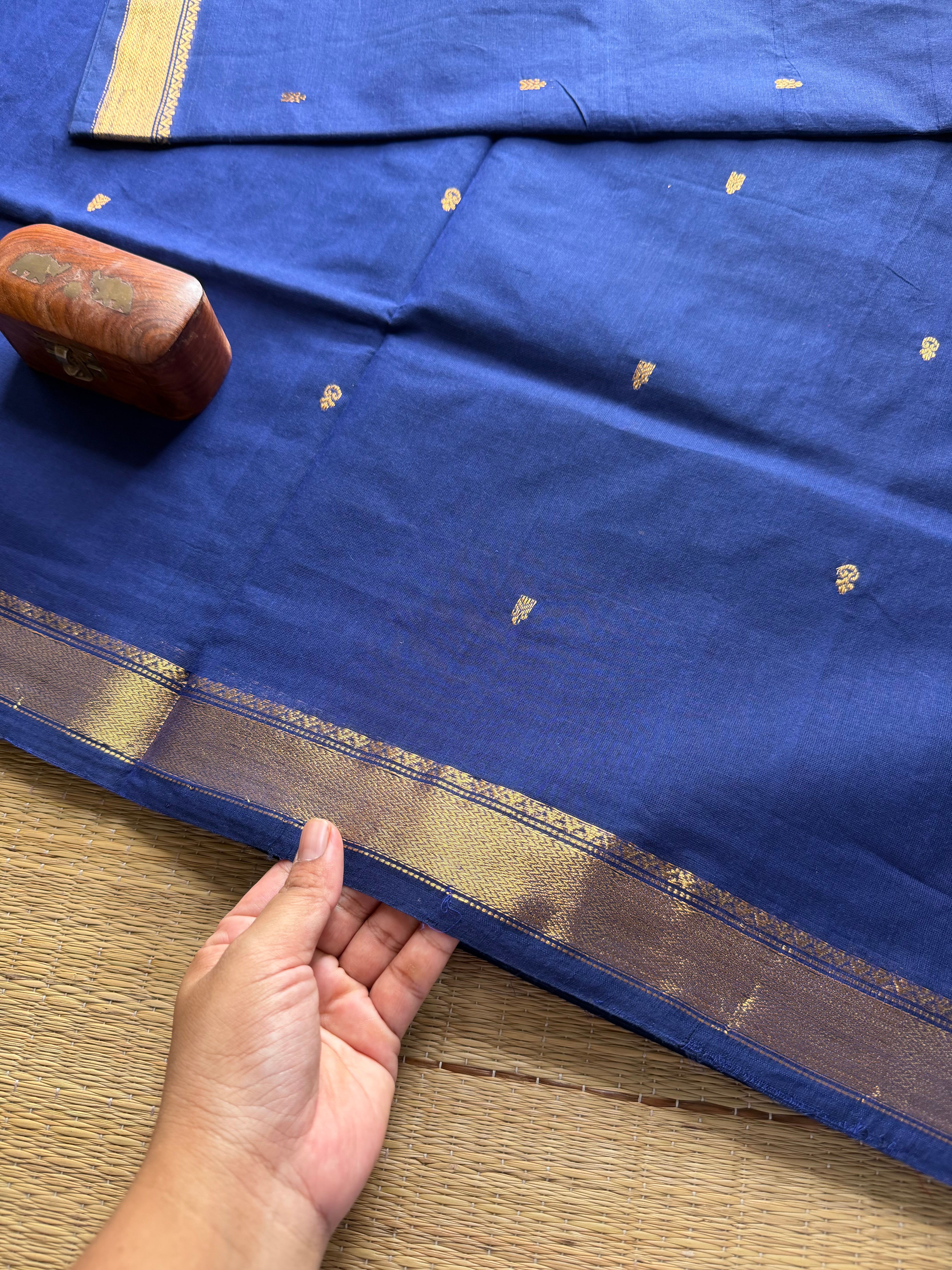 Monotone royal blue shade small border Kanchi cotton saree with handmade golden Zari Buttas