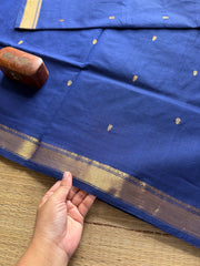 Monotone royal blue shade small border Kanchi cotton saree with handmade golden Zari Buttas