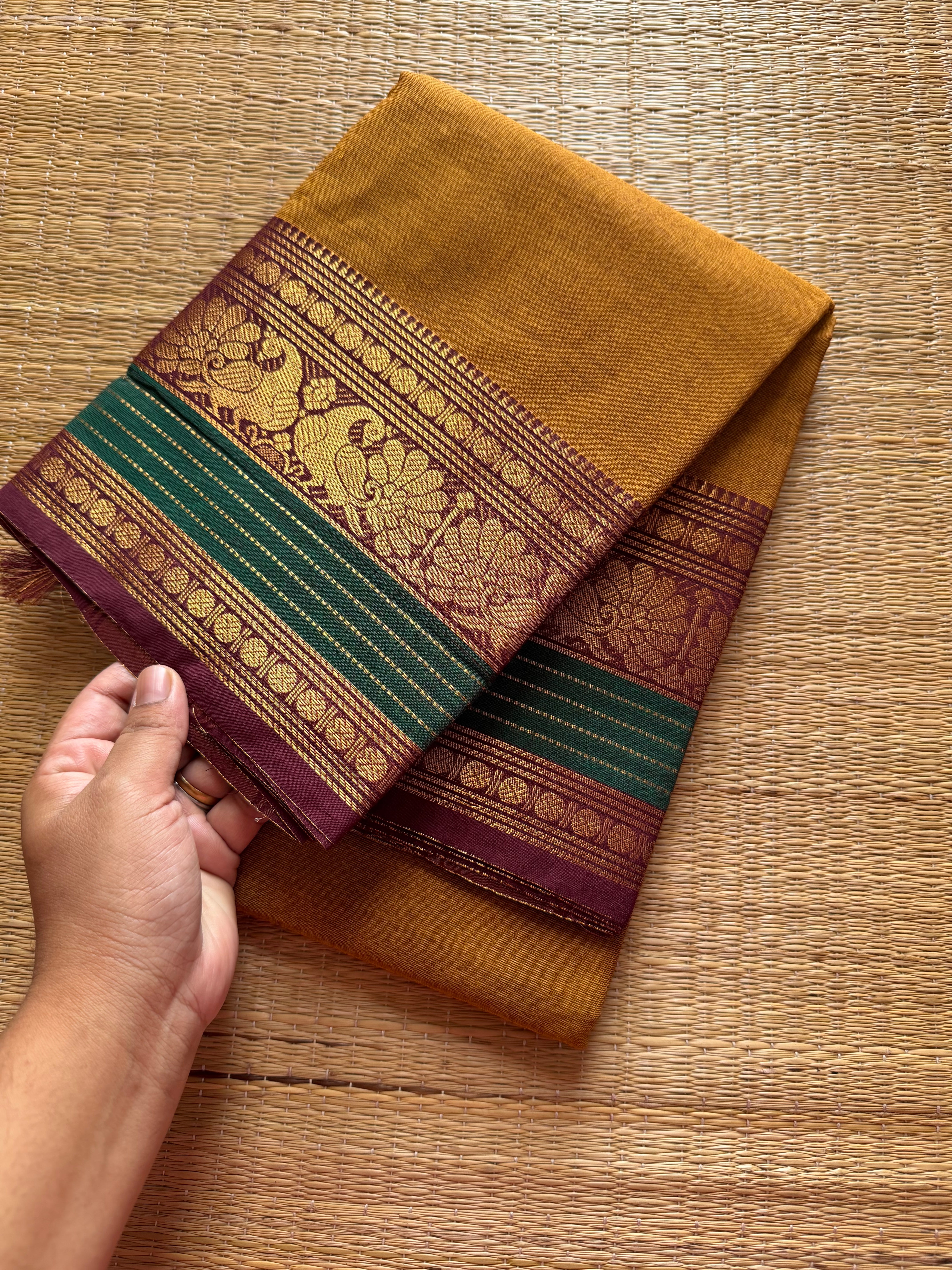 RF179 Mustard with contrast brown and green peacock pattern Kanchi cotton saree