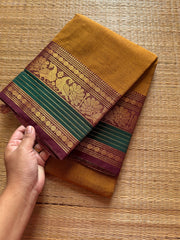 RF179 Mustard with contrast brown and green peacock pattern Kanchi cotton saree