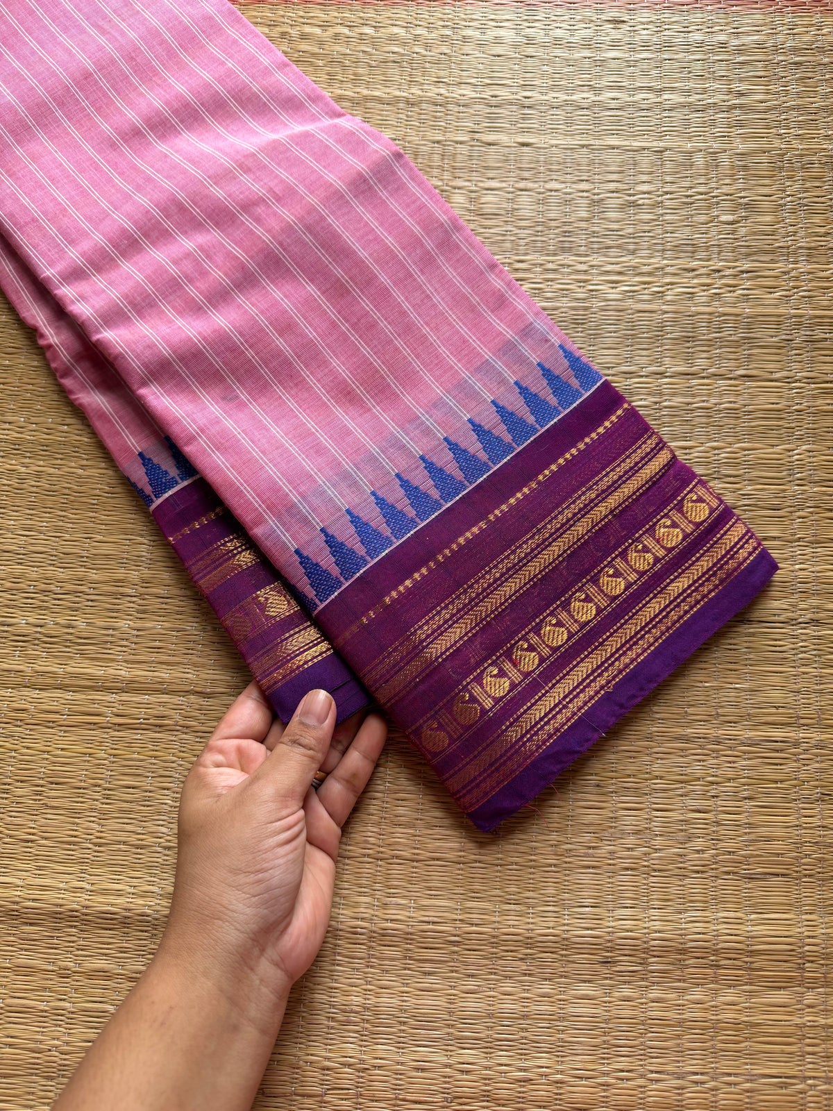 Pastel pink with contrast purple combination Kanchi cotton saree with vertical stripped pattern & mango Zari border