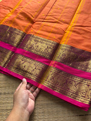 RF701 Orange shade Kanchi cotton saree with Rettapet border & handmade thread buttas
