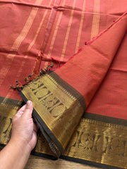 Rust orange shade podi kattam Kanchi cotton saree with Annam golden Zari border