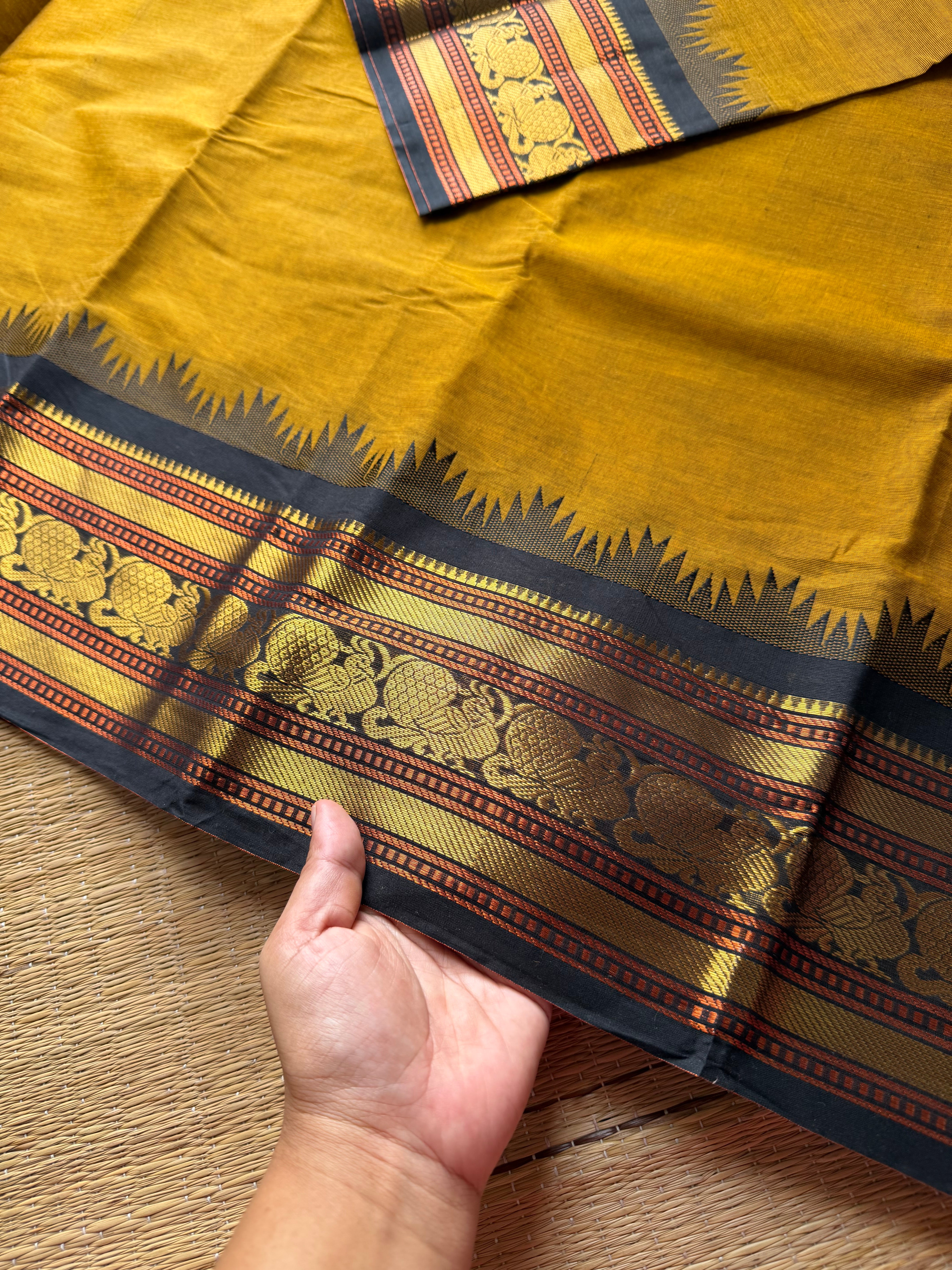 RF493 Mustard with black combination Thazhampoo pattern Kanchi cotton saree