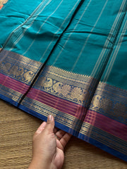 Teal blue shad Kanchi cotton saree with Annam pattern contrast border