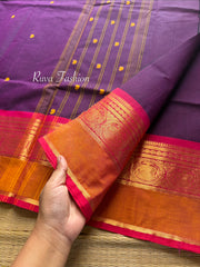 Purple shade Kanchi cotton saree with contrast red and orange combination with handmade thread buttas