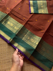 RF513 Honey shade with contrast green and purple combination Kanchi cotton saree with handmade thread buttas