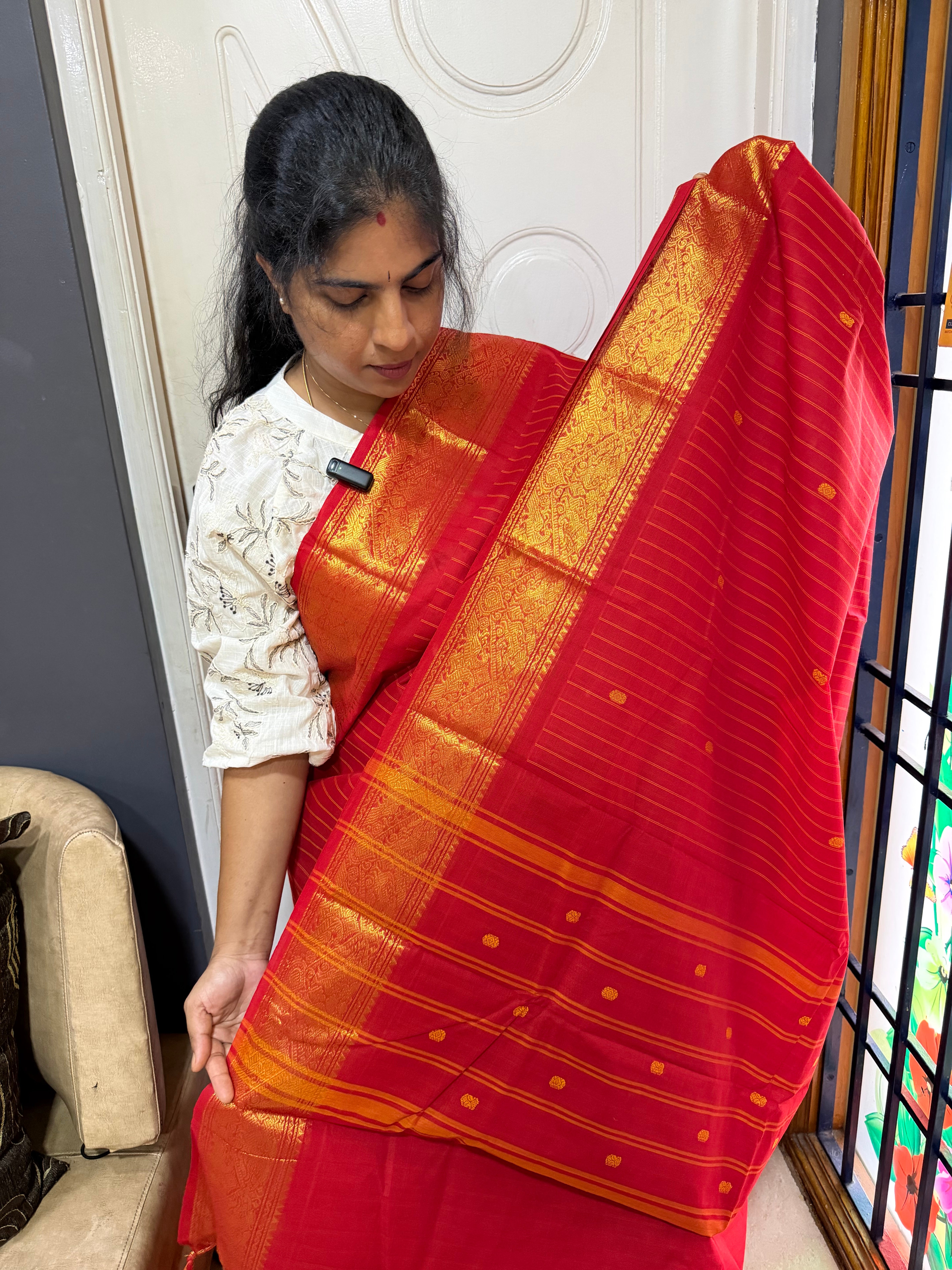 RF593 Classic Monotone Red shade & Intricate zari woven Vanasingaram Border with Vaira Oosi thread vertical lines pattern & handmade thread  Buttas