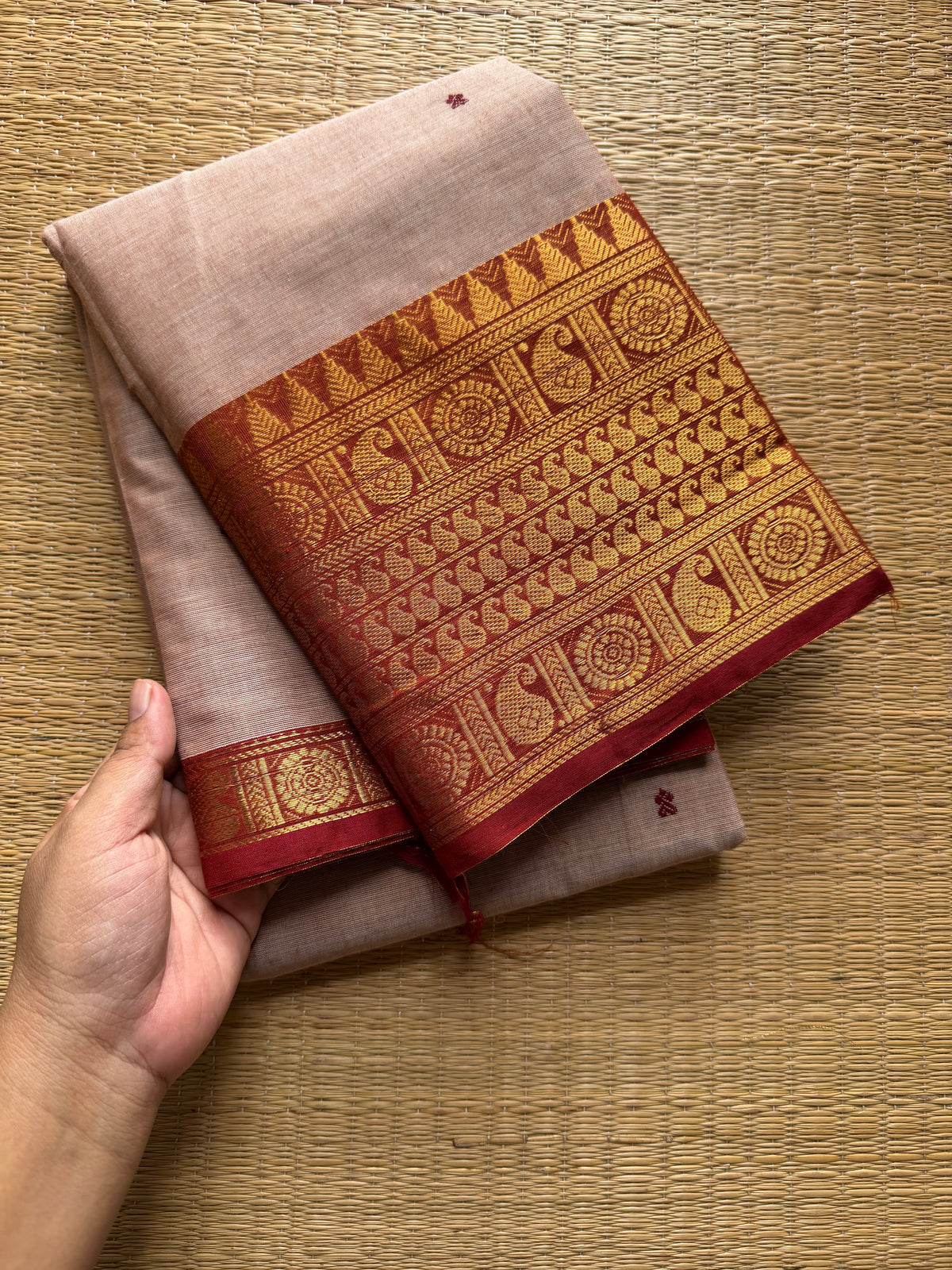 Beige with rust orange combination Kanchi cotton saree with handmade thread buttas