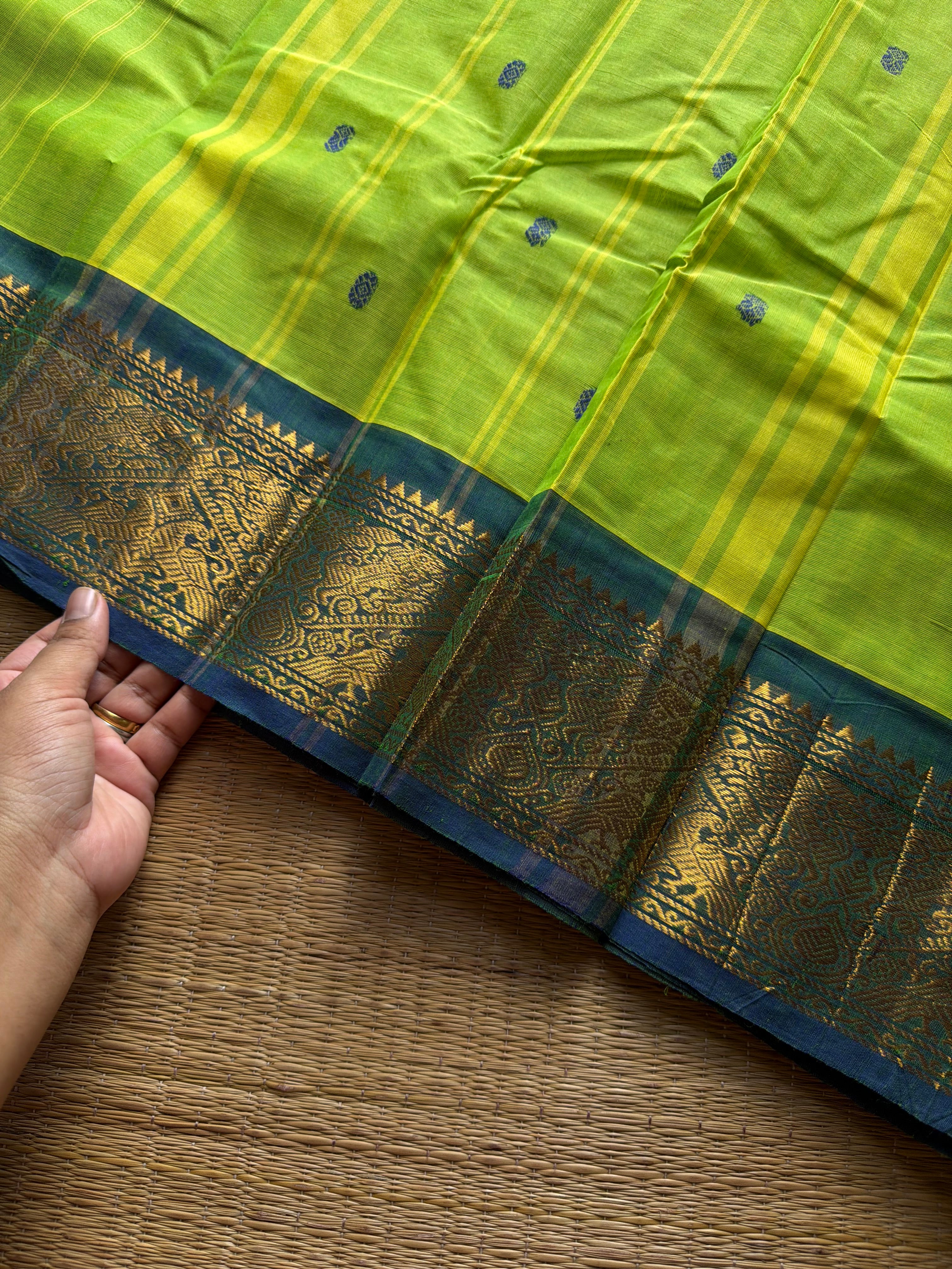 RF1406 Parrot green ~ Vanasingaram border Kanchi cotton saree with handmade thread buttas