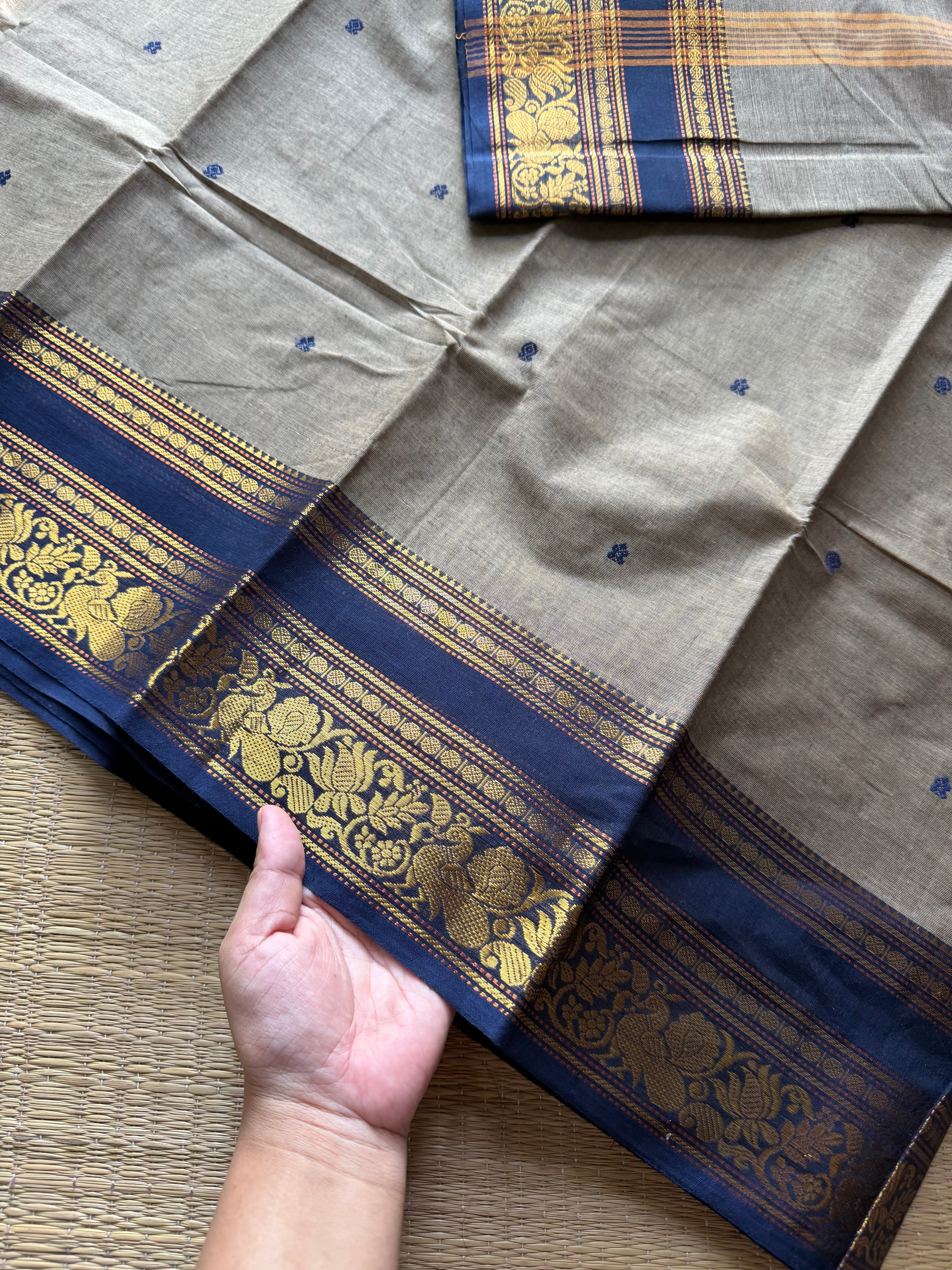 Grey Kanchi Cotton Saree With Contrast Navy Blue Shade Annam & lotus pattern border and handmade thread buttas