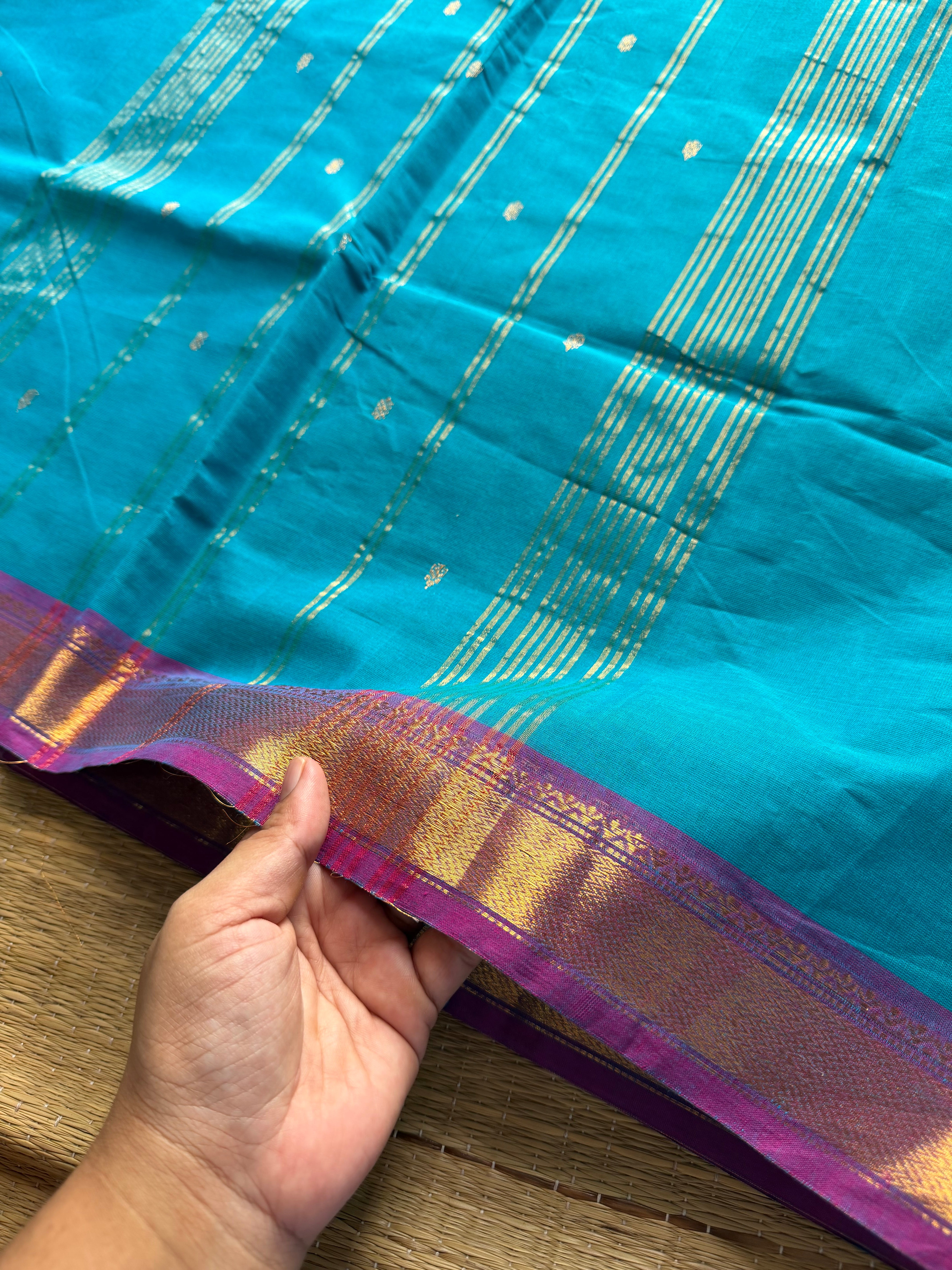 RF331 Sky blue shade with purple combination small border Kanchi cotton saree with handmade golden Zari Buttas