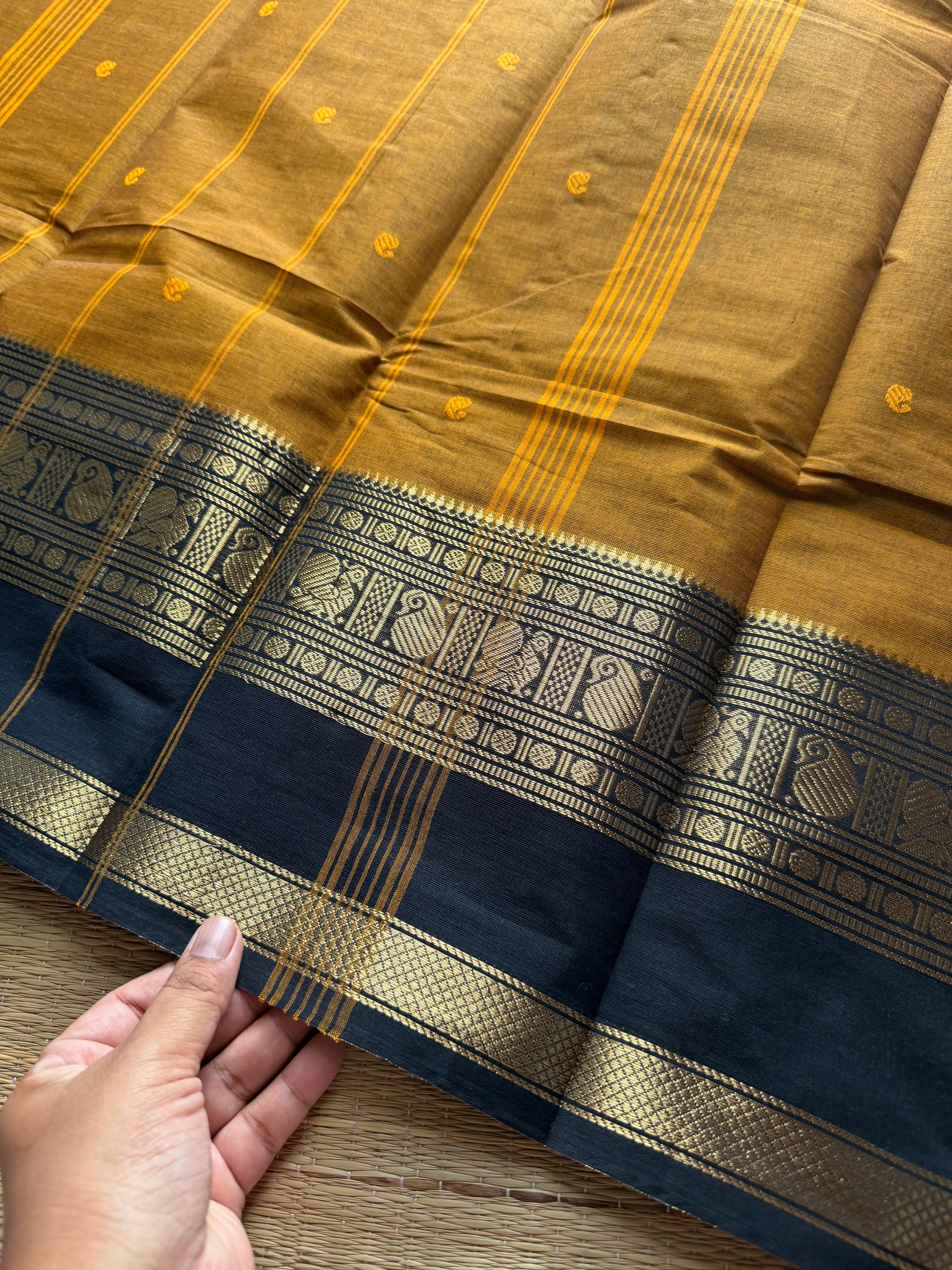 RF288 Mustard with black combination Kanchi cotton saree with Rettapet border and handmade thread buttas
