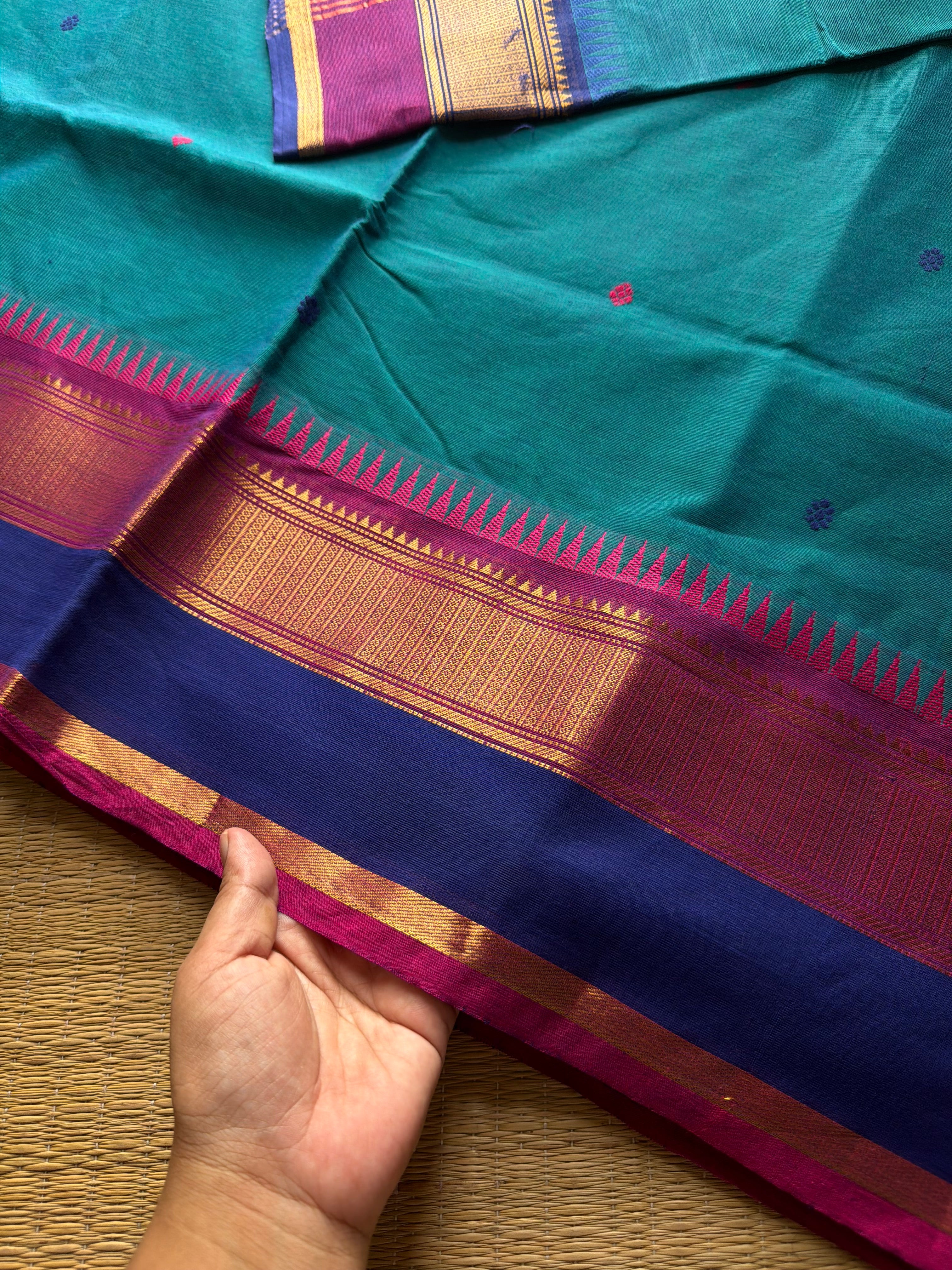 RF740 Peacock blue shade Kanchi cotton saree with Ganga Jamuna border and handmade thread buttas