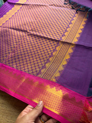 Purple shade with contrast small pink zari small Thazhampoo border Kanchi cotton saree with rich Zari woven Pallu & hand made Zari Buttas