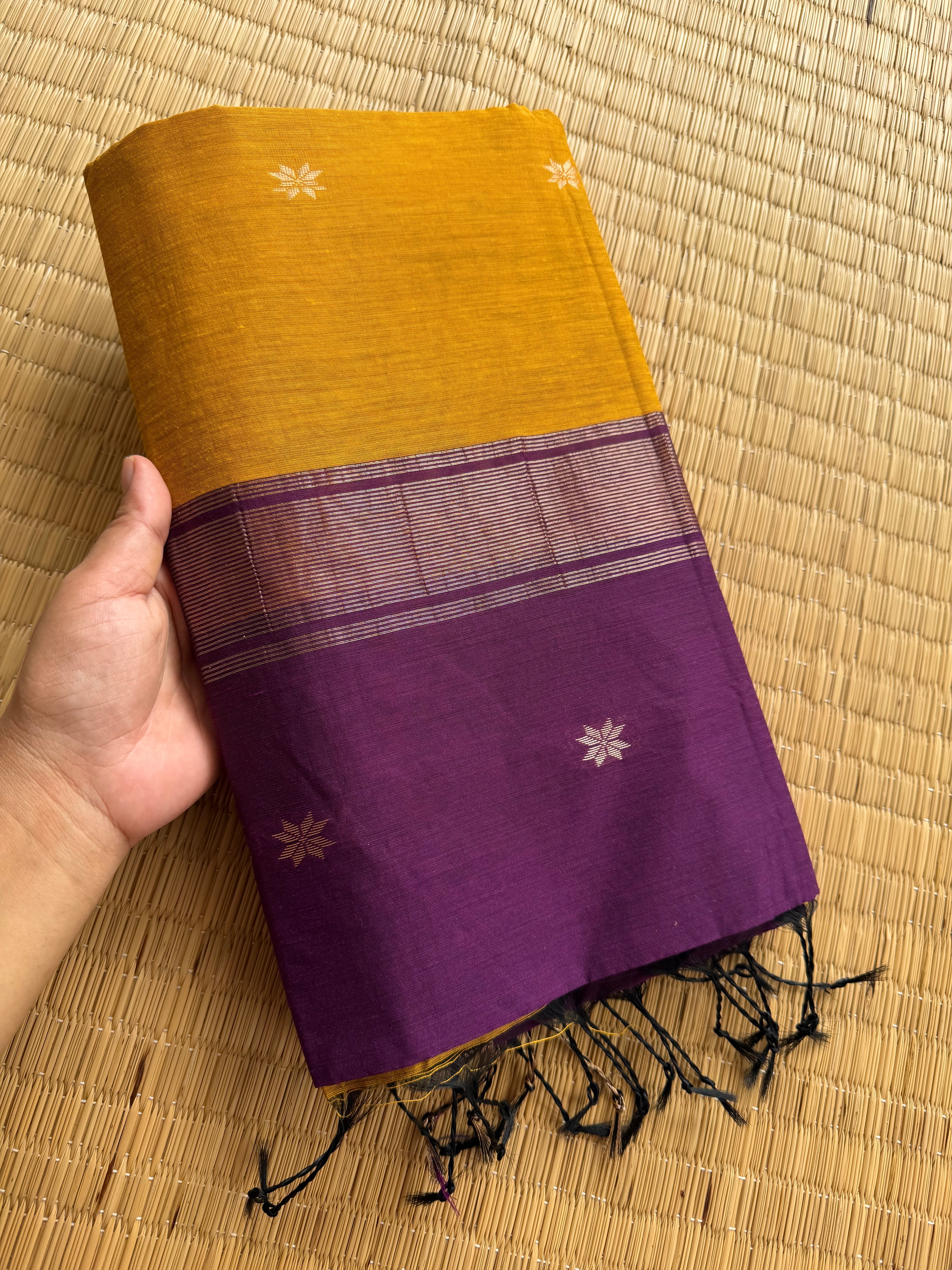 RF155 Mustard yellow body paired with a deep purple contrast border and pallu Maheswari Semi Silk Cotton Saree with star pattern Zari Buttas