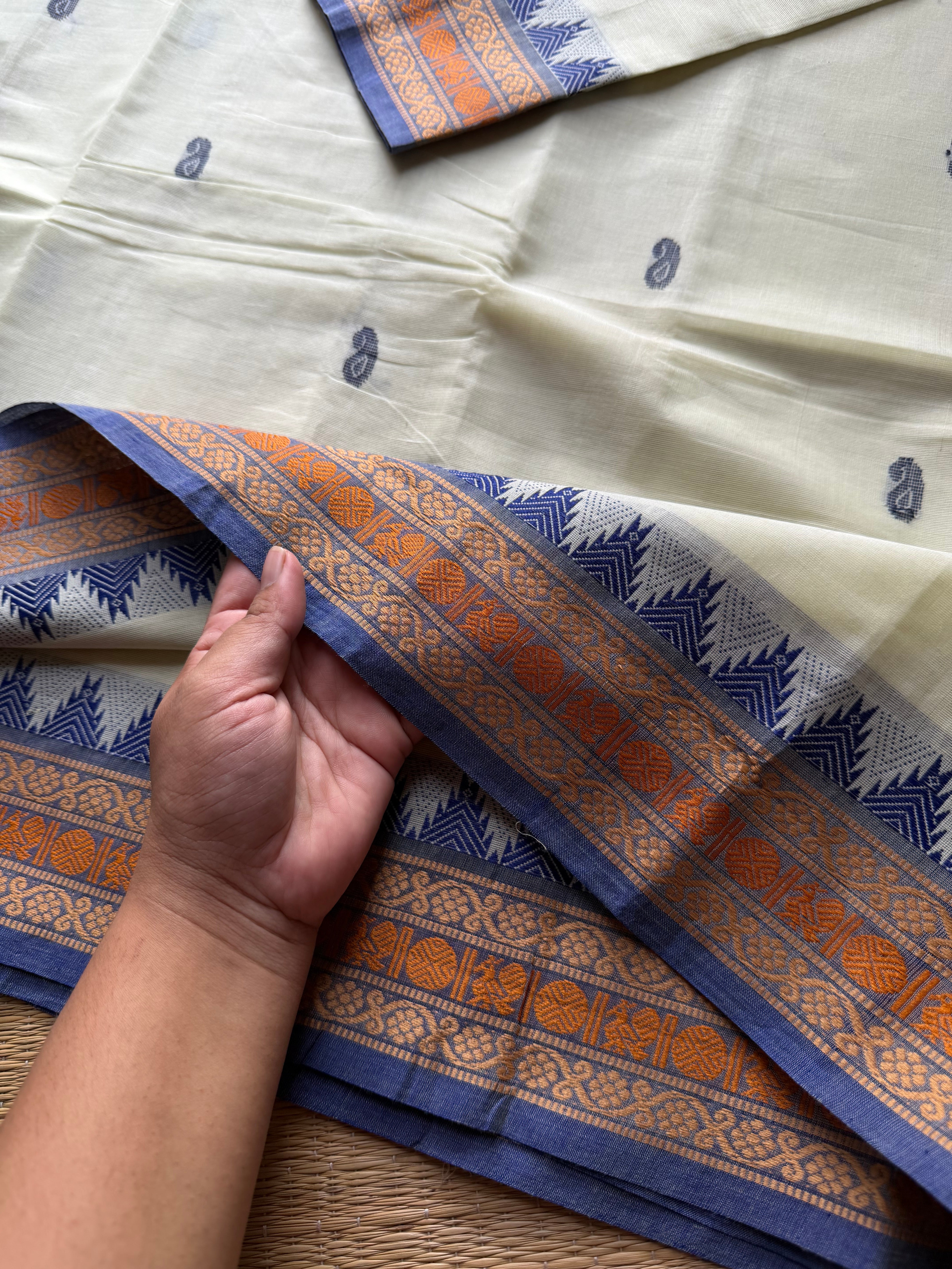 Elegant Thread Border ~ Pastel shade Kanchi Cotton Saree with small Thazhampoo pattern thread border & handmade thread buttas