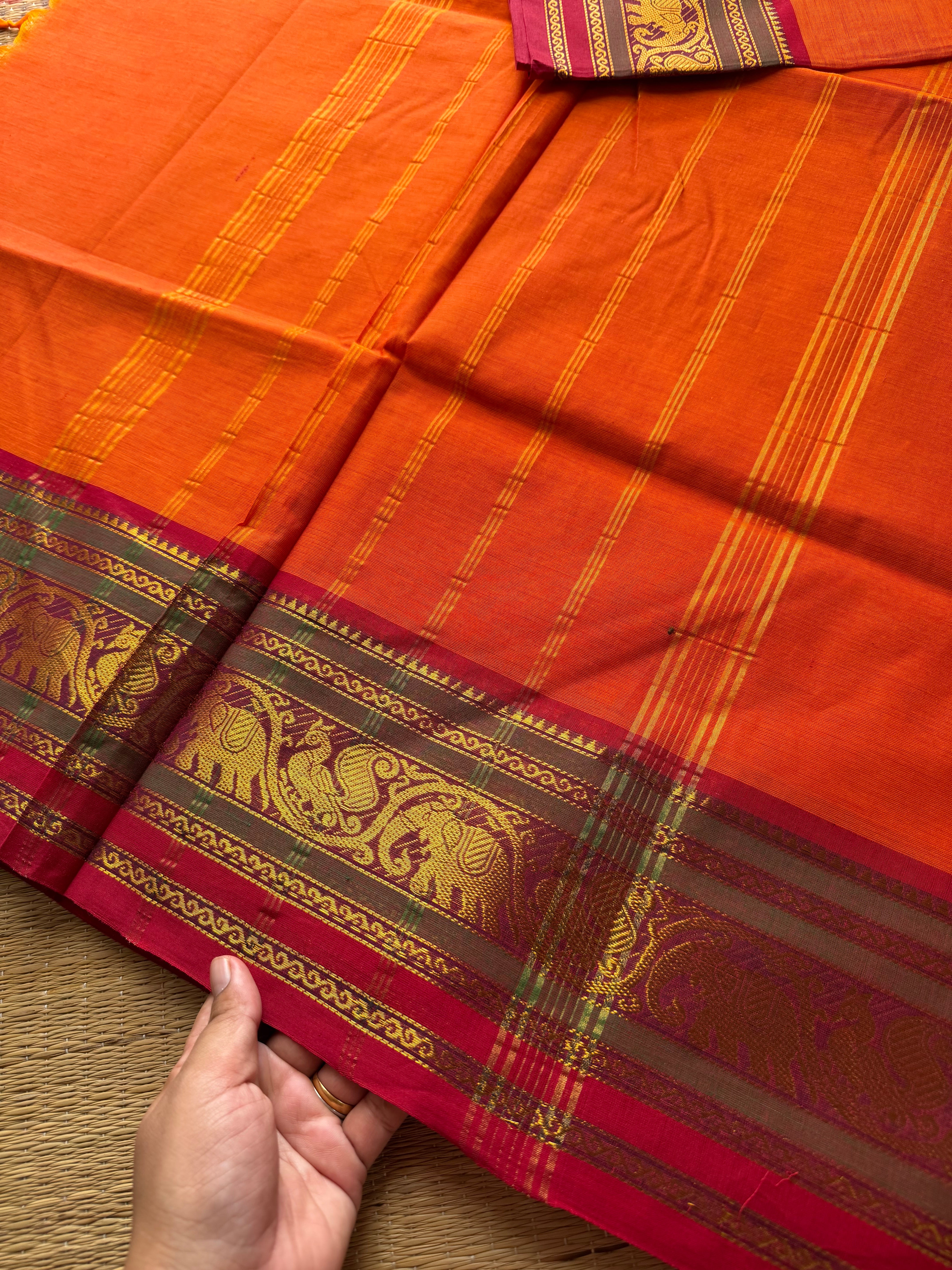 Orange with red & green combination Kanchi cotton saree with Annam & elephant pattern contrast double color border