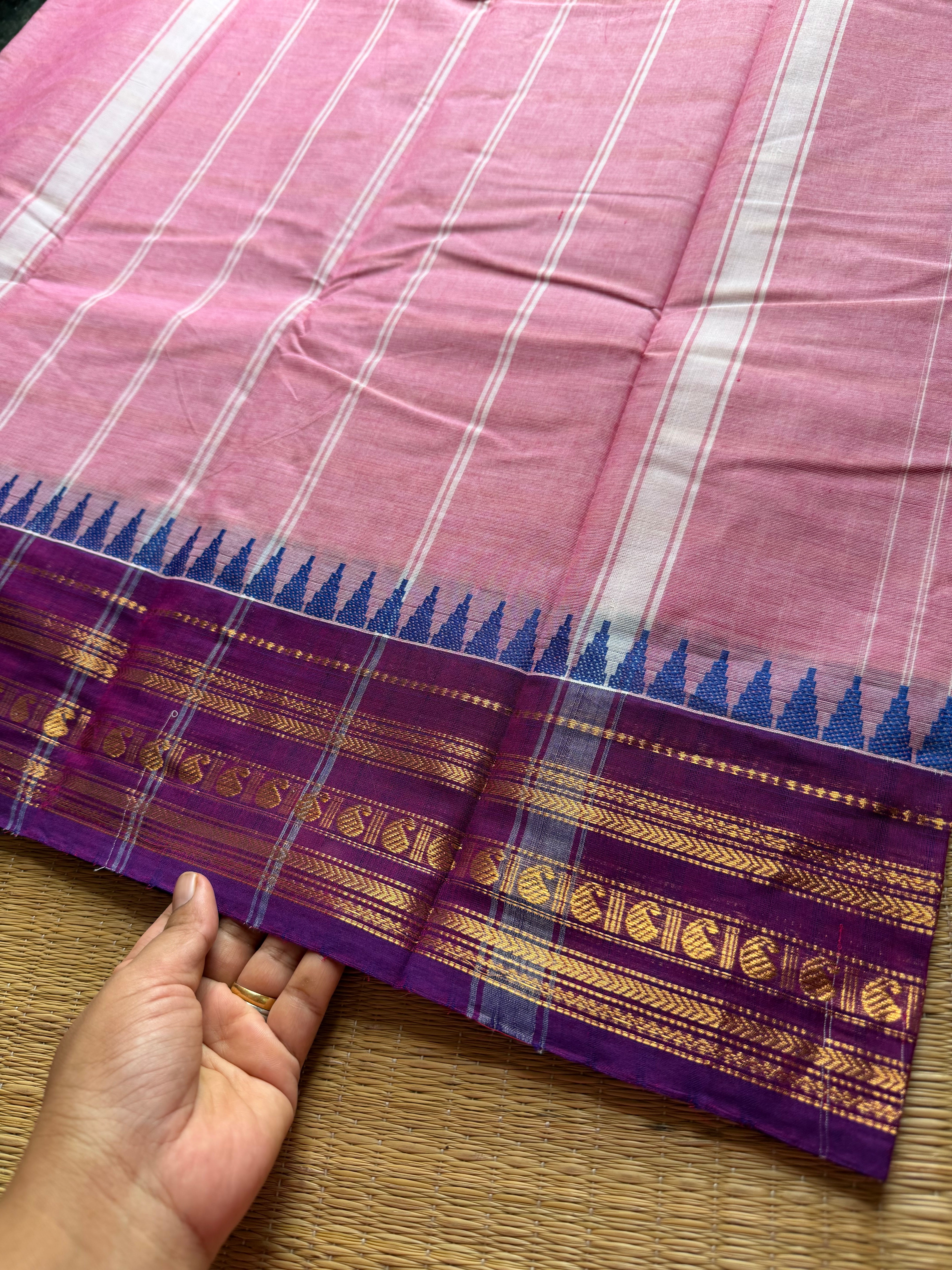 Pastel pink with contrast purple combination Kanchi cotton saree with vertical stripped pattern & mango Zari border