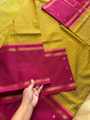 Dual tone green and yellow mixed shade with contrast pink combination Vintage l Border Kanchi Cotton Saree With kattam / checks pattern & handwoven Buttas on the border