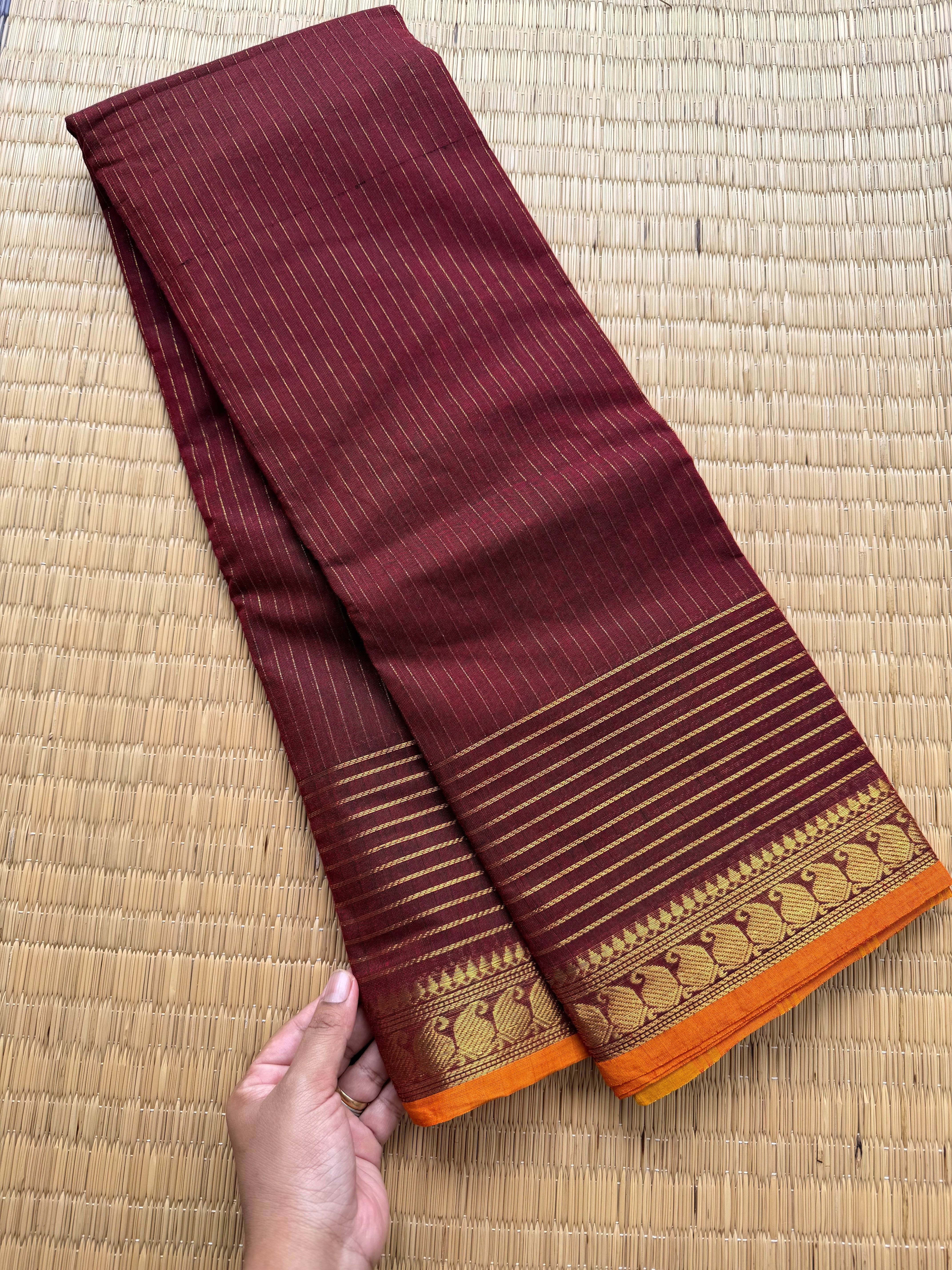 RF143 Arakku / Maroon Shade Vaira Oosi pattern Kanchi cotton saree small contrast orange shade mango Zari border