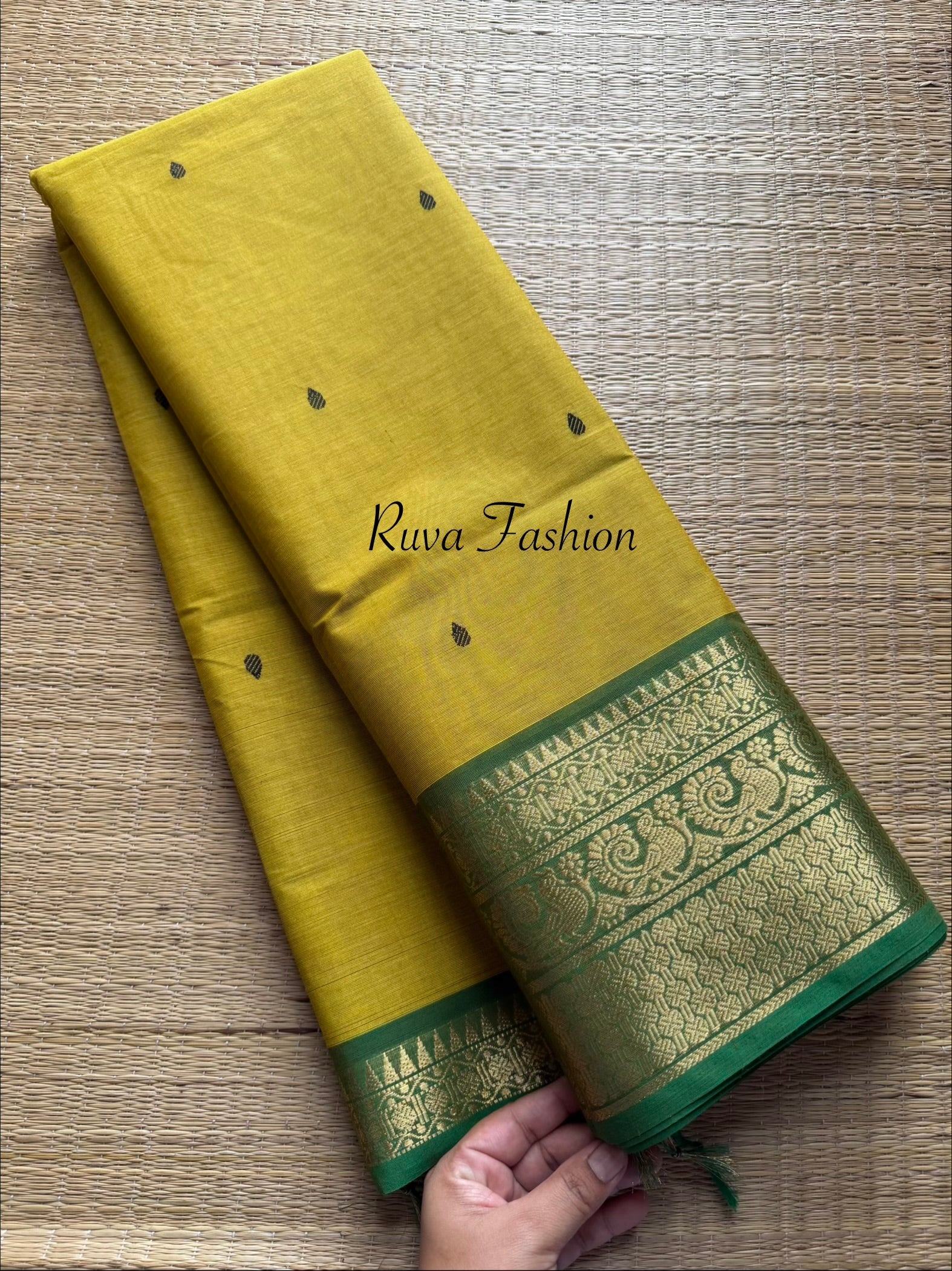 Mustard yellow tone with contrast green Zari border Kanchi cotton saree with handmade thread buttas