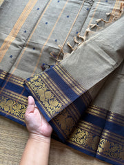 Grey Kanchi Cotton Saree With Contrast Navy Blue Shade Annam & lotus pattern border and handmade thread buttas
