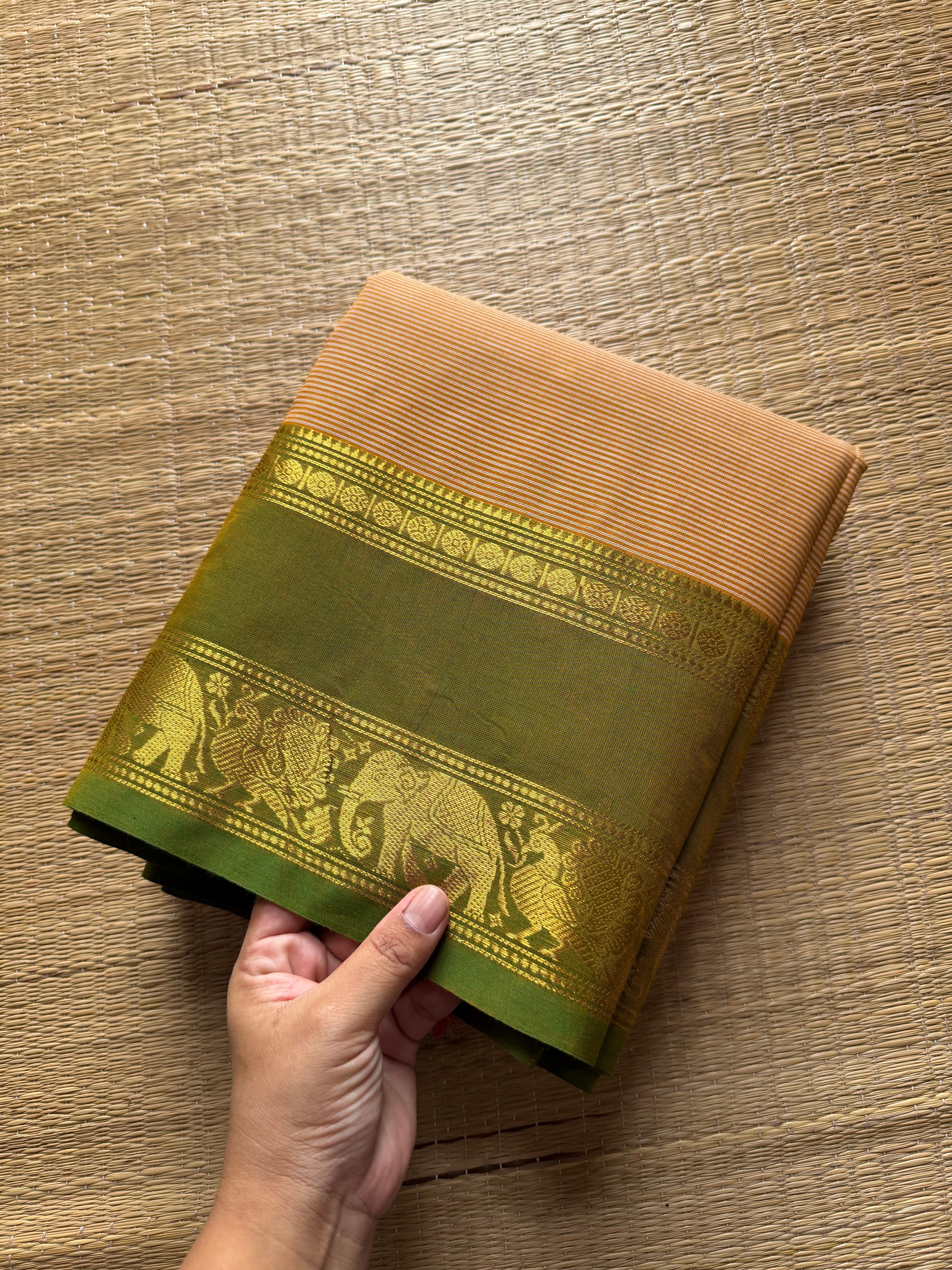 Beige shade Kanchi cotton saree with small horizontal stripped pattern with unique Ganga Jamuna border