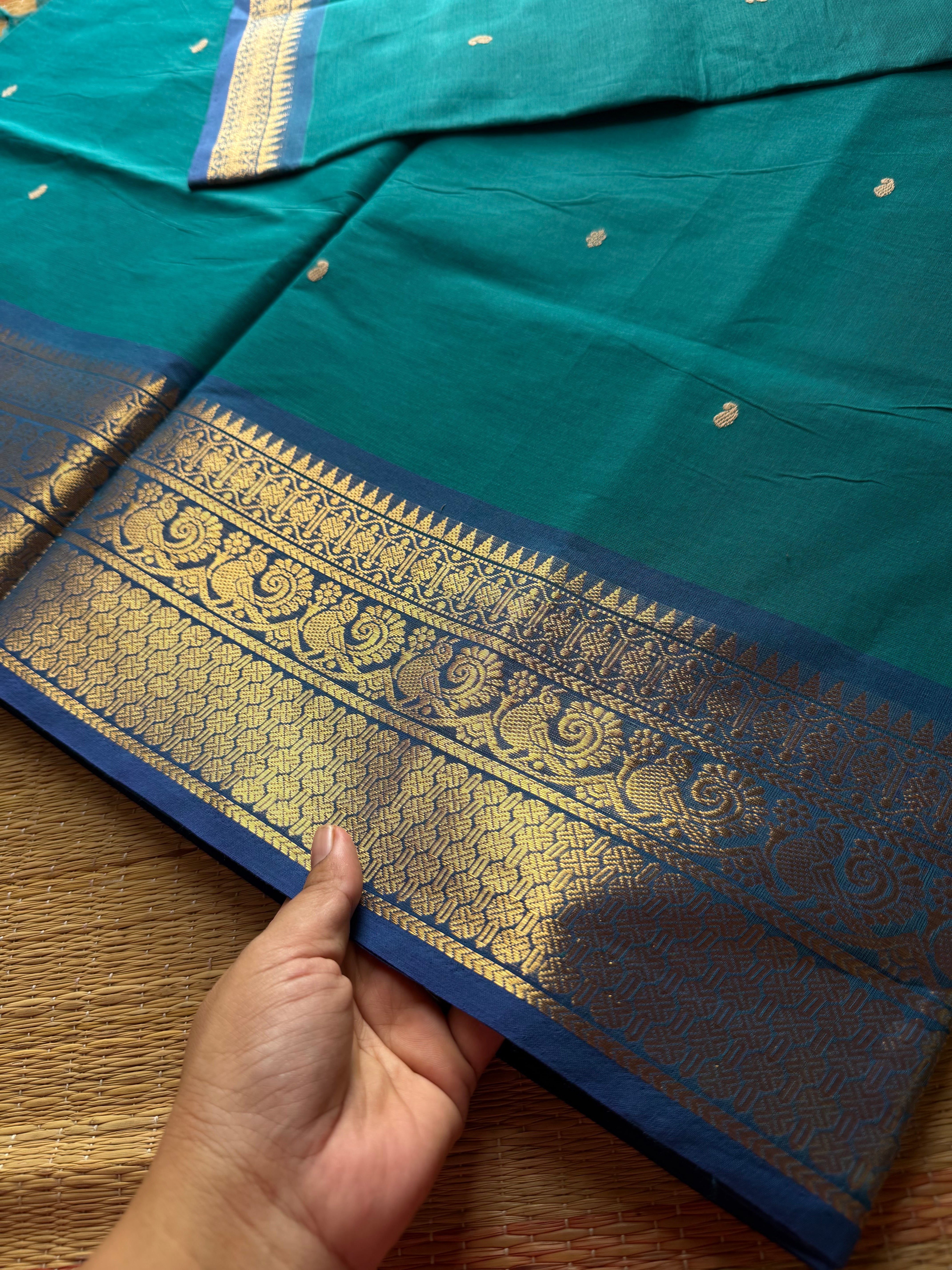 Dark teal blue Kanchi cotton saree with contrast royal blue border Annam pattern with handmade thread buttas