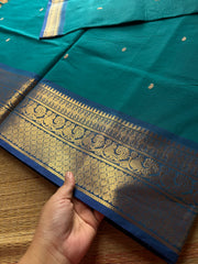 Dark teal blue Kanchi cotton saree with contrast royal blue border Annam pattern with handmade thread buttas