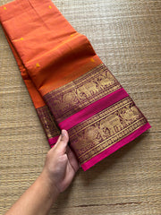 RF701 Orange shade Kanchi cotton saree with Rettapet border & handmade thread buttas